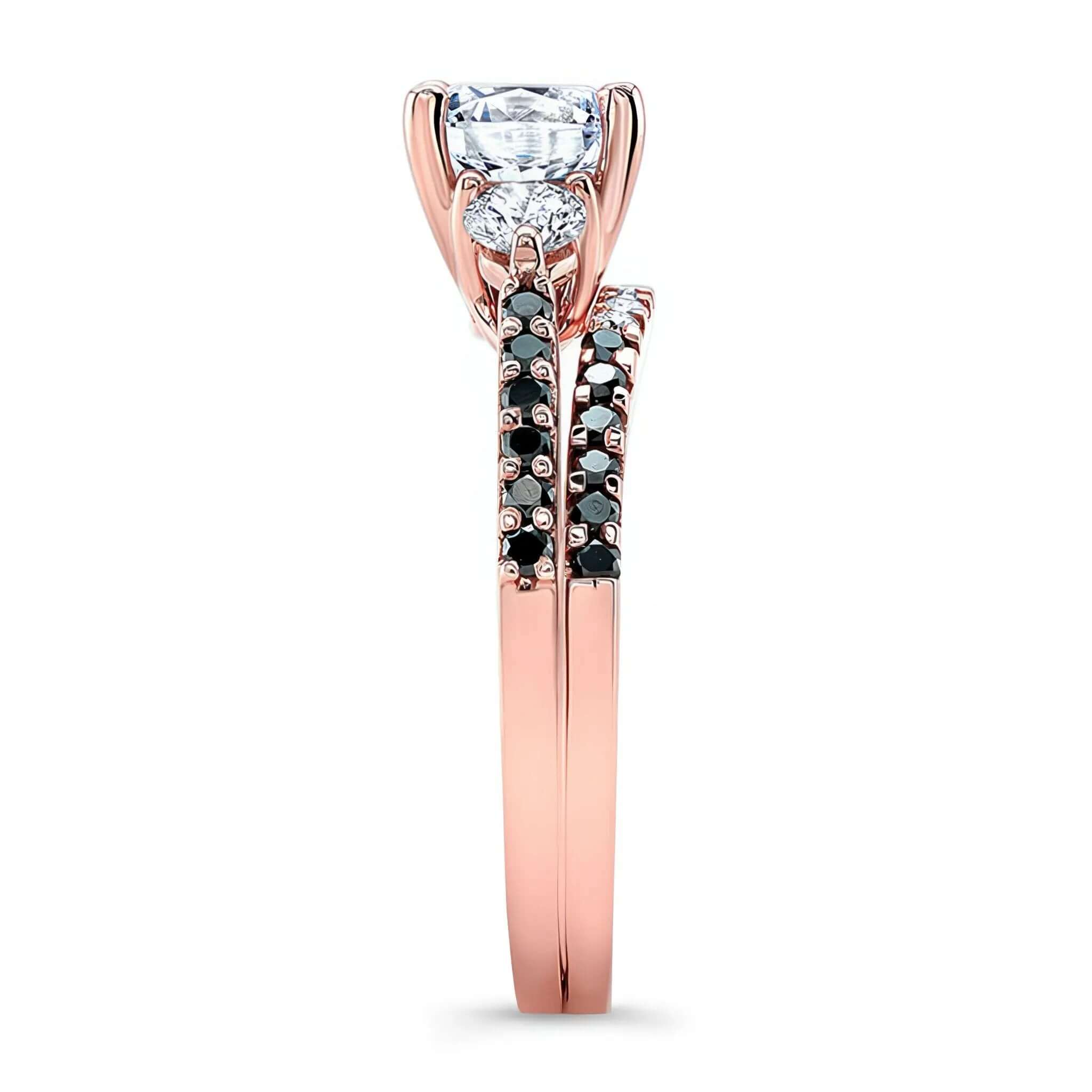 3 Stone Black Diamond Accent Wedding Ring Set featuring a prong-set center and accented with black and white diamonds.