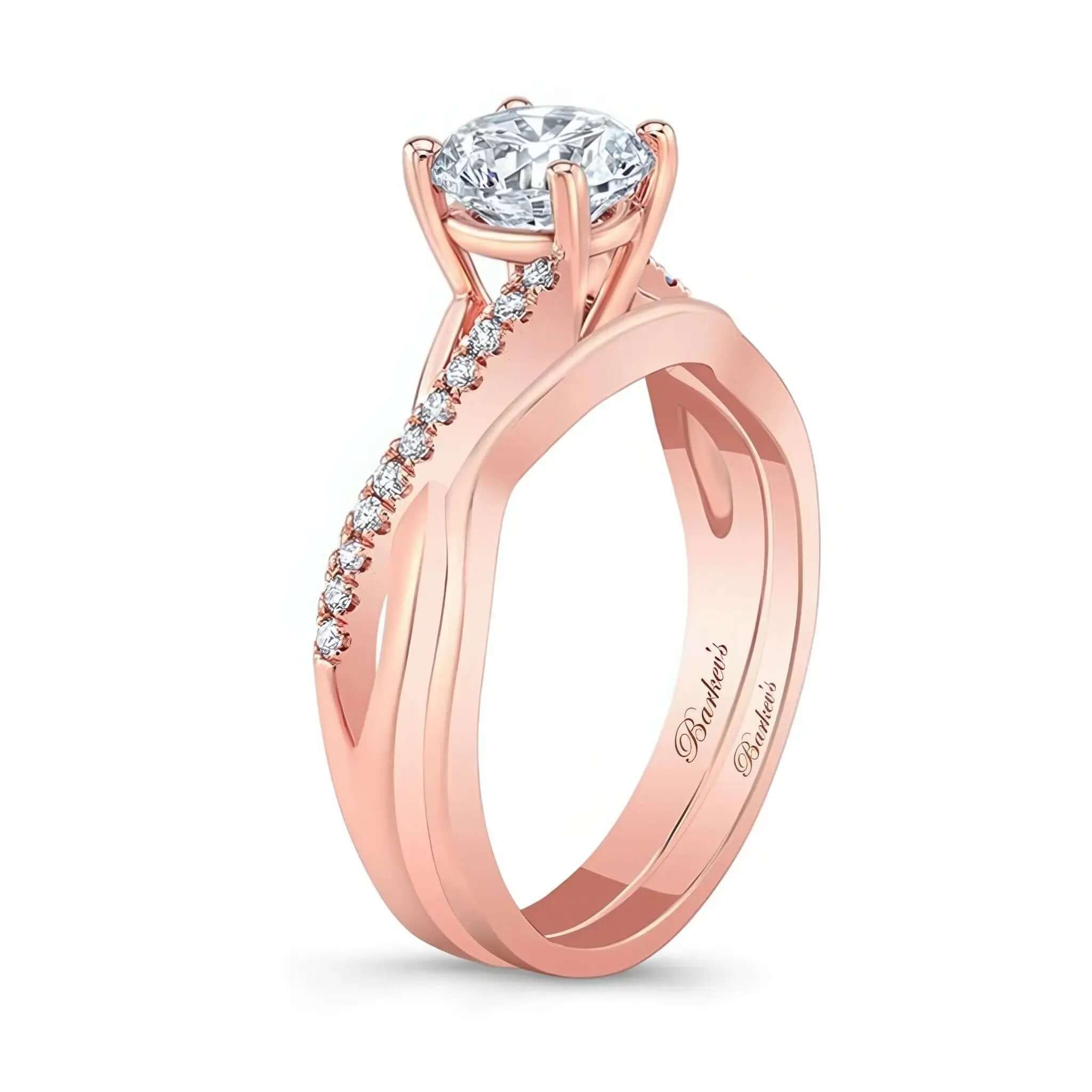 Simple Diamond Bridal Set featuring a prong set round center and intertwined shoulders with diamond melees.