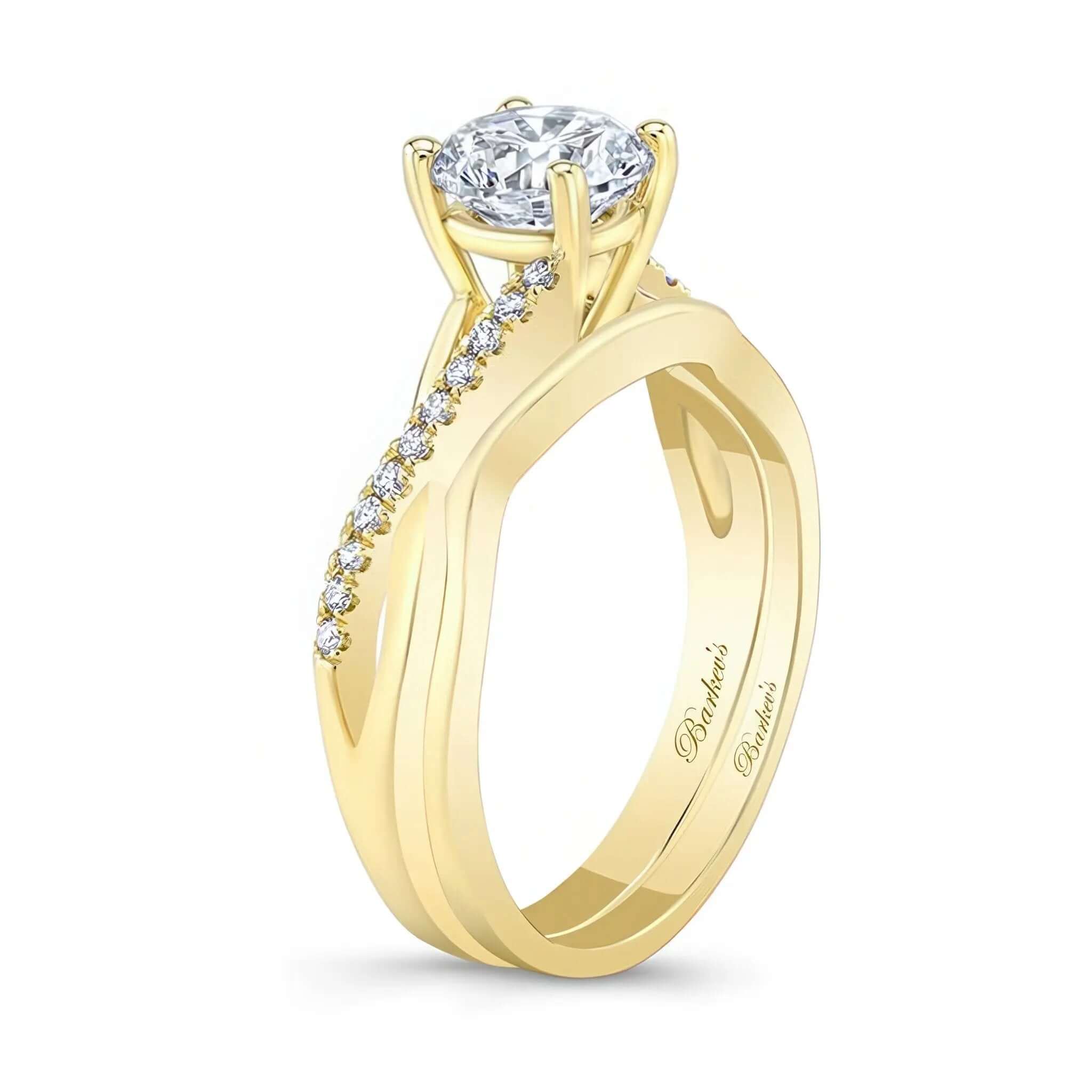 Simple Diamond Bridal Set featuring a prong set round center and intertwined diamond shoulders.