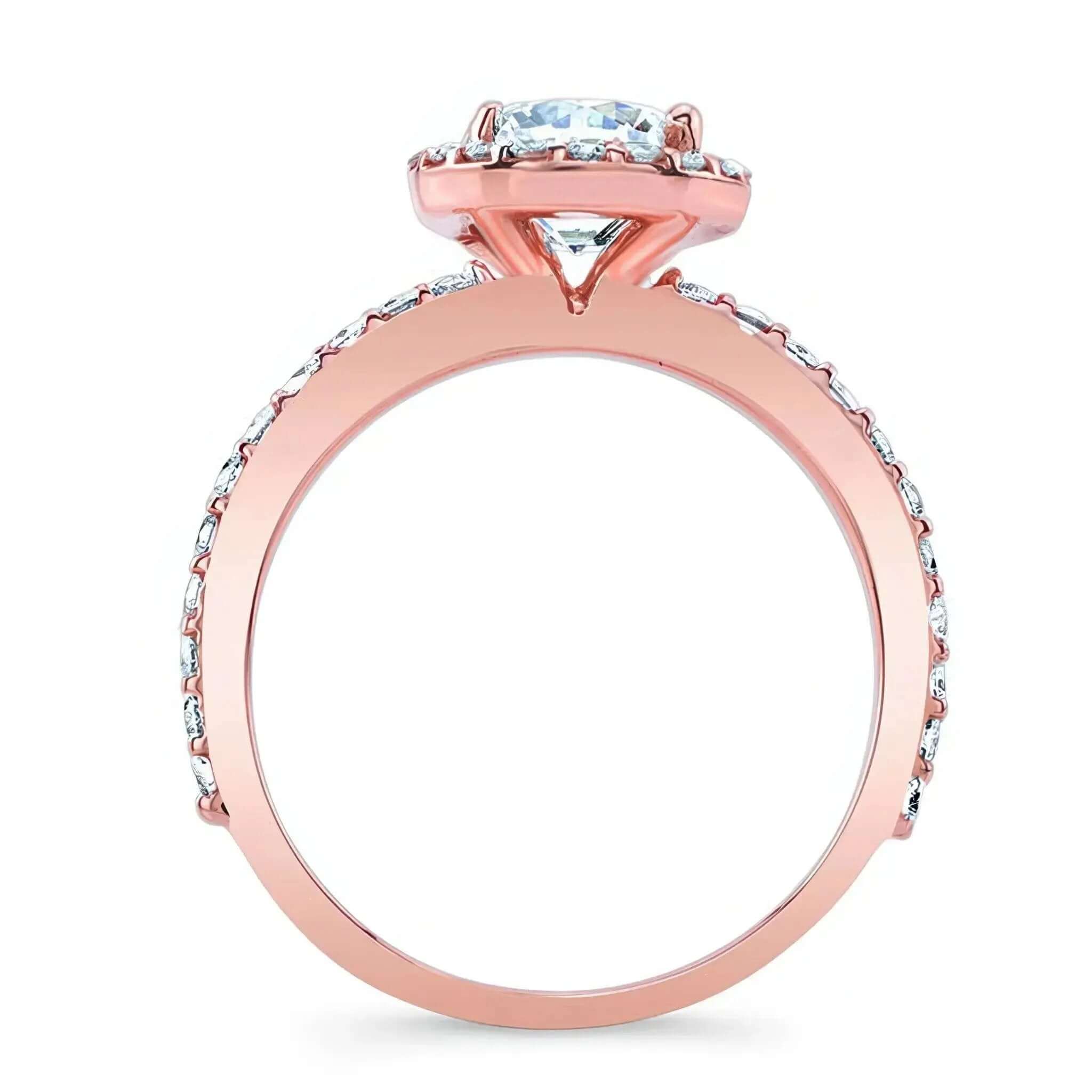 Moissanite Halo Ring featuring a round center stone and elegant halo design with diamonds on the shank.