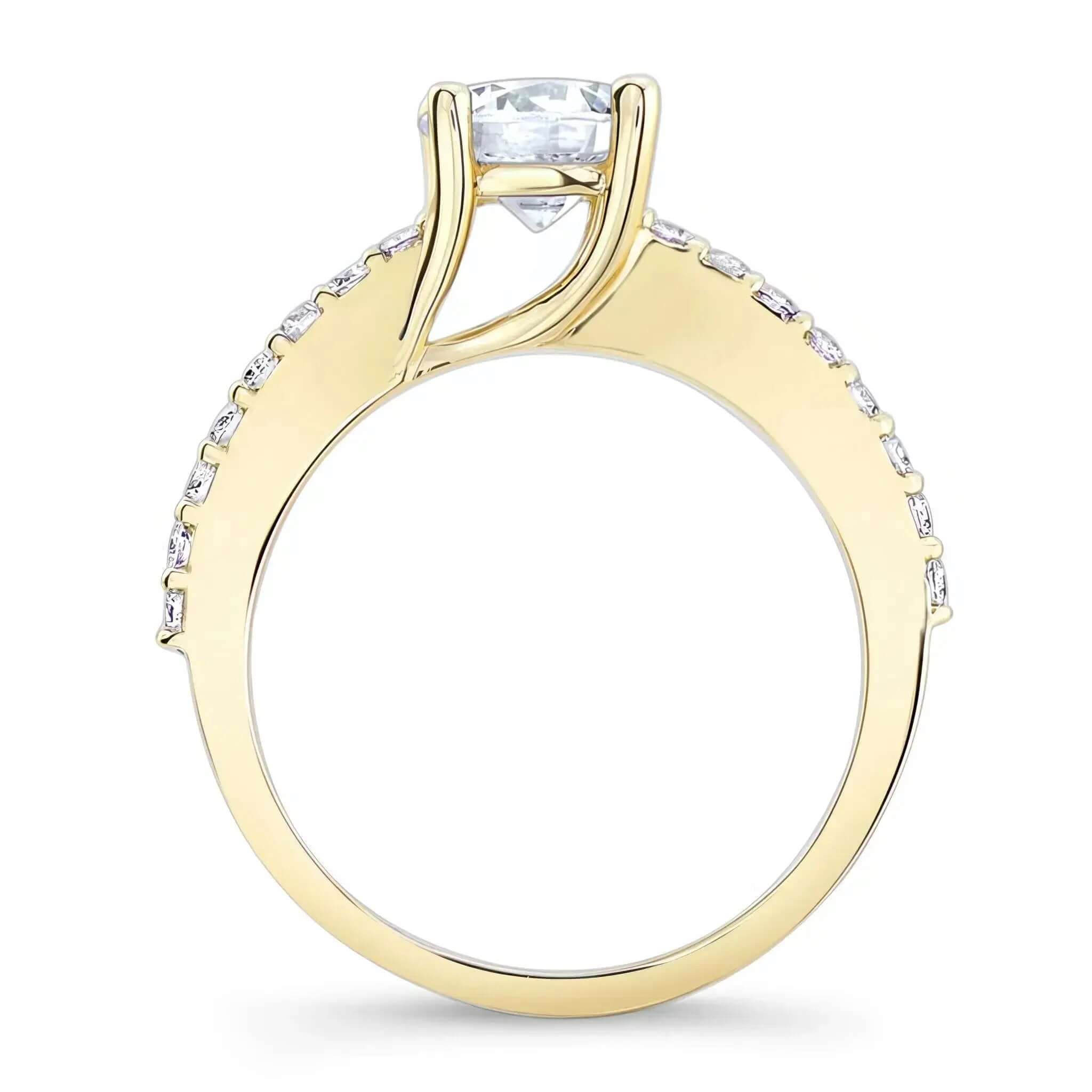 4 Prong Engagement Ring with round center and shared prong set diamonds on the shoulders.
