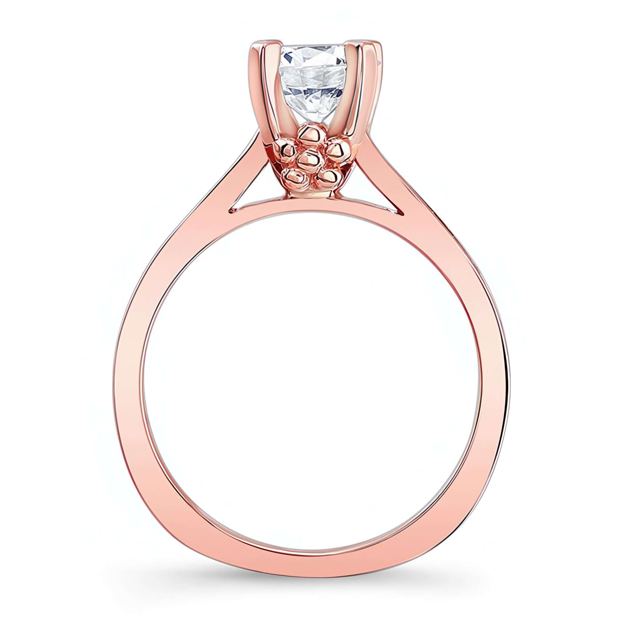 Channel Set Diamond Ring featuring a prong set round center and elegant shoulders of channel set diamonds.
