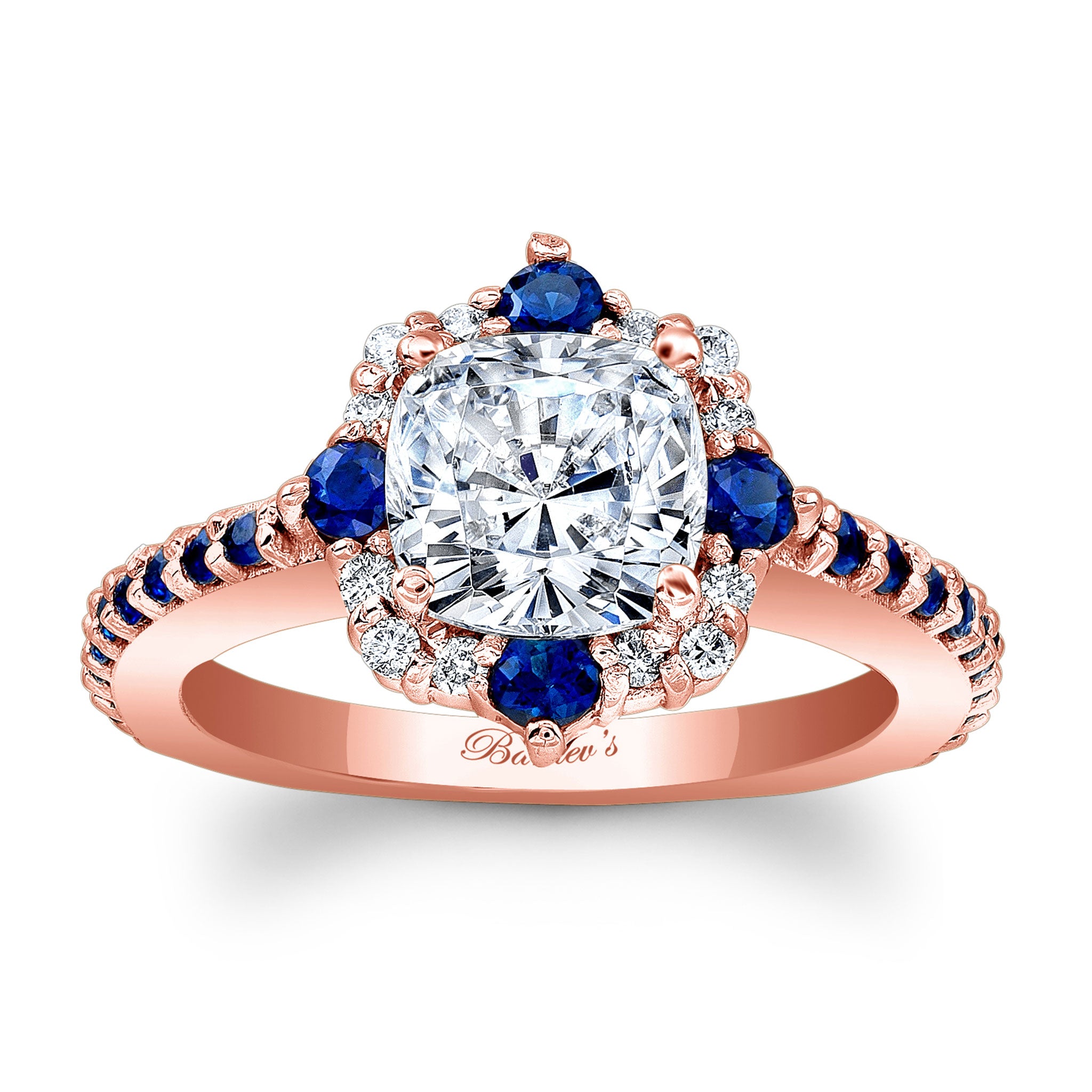 Rose gold ring with a diamond and blue gemstones on a white background
