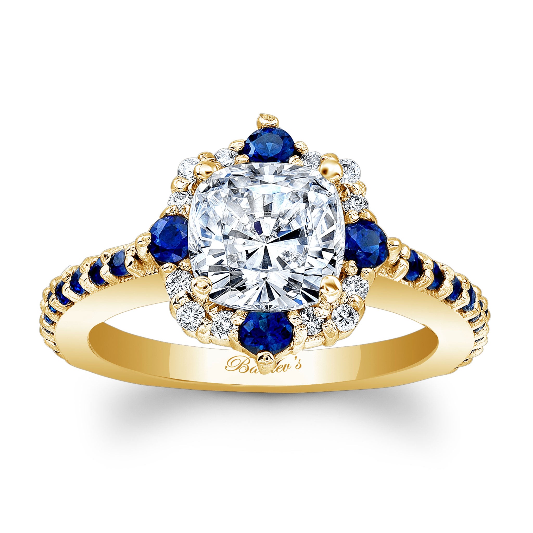 Gold ring with a diamond and blue gemstones on a white background