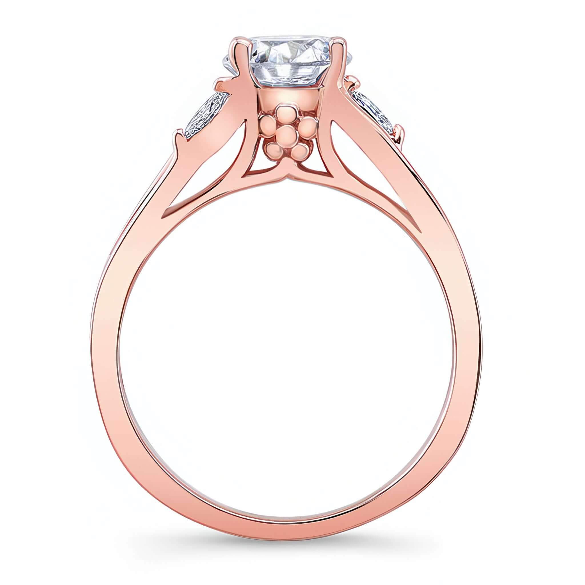 V Shaped Moissanite Ring featuring a prong set round center and marquise cut diamond accents.