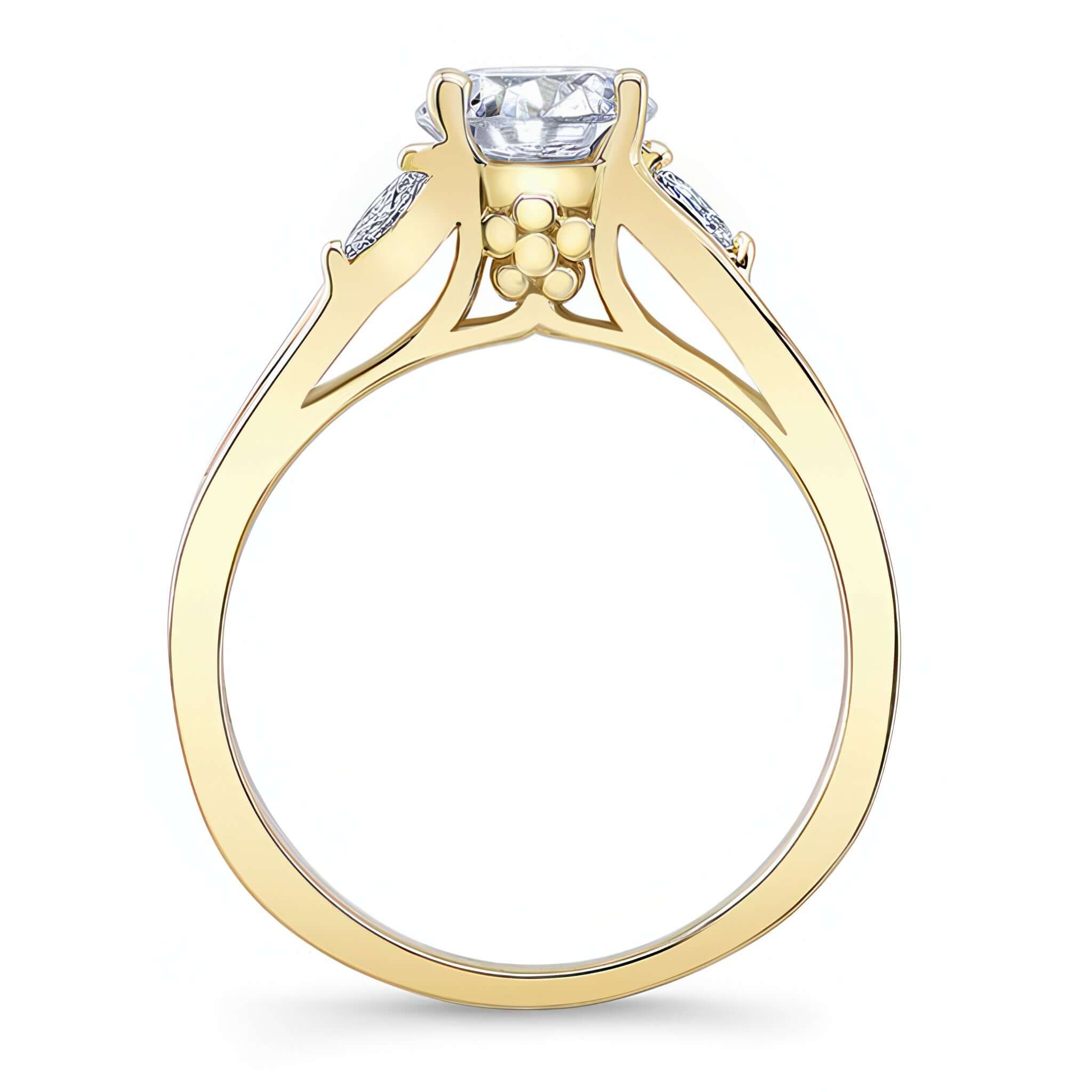 V Shaped Moissanite Ring with a prong set round center and marquise cut diamond accents.