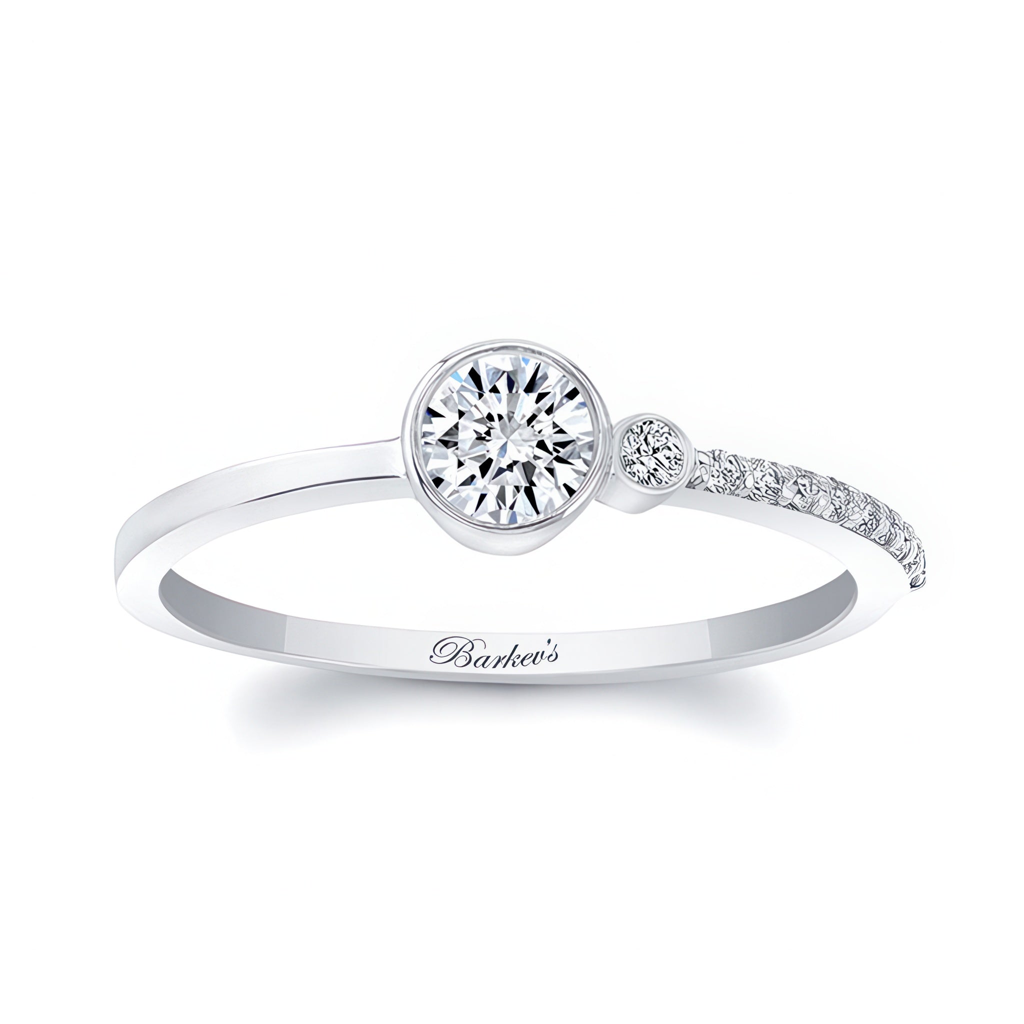 Olivia unique diamond promise ring in white gold featuring a round center diamond and delicate shared prong side diamonds.