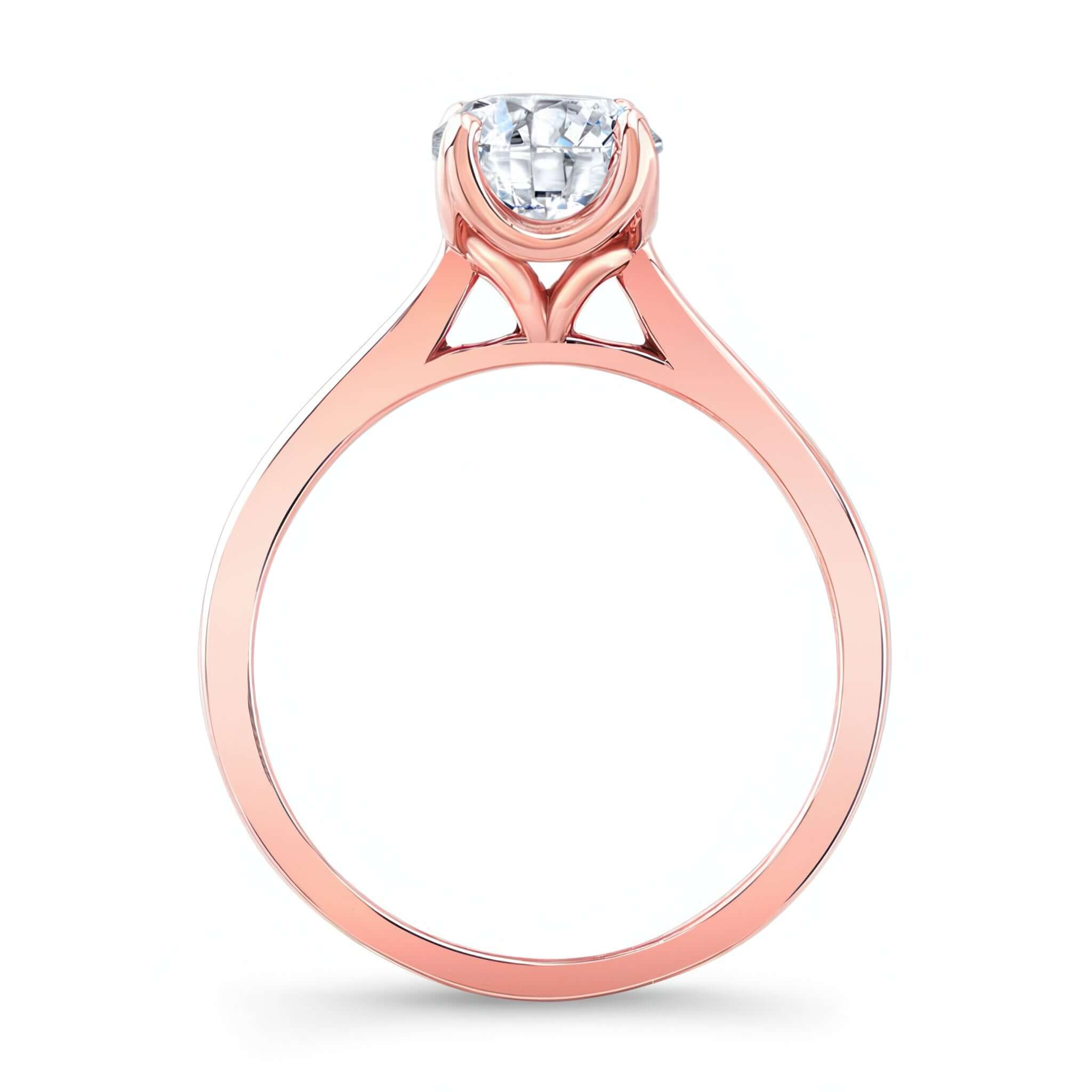 Delicate Curved Lab Grown Diamond Solitaire Ring featuring a brilliant round center in a rose gold setting.