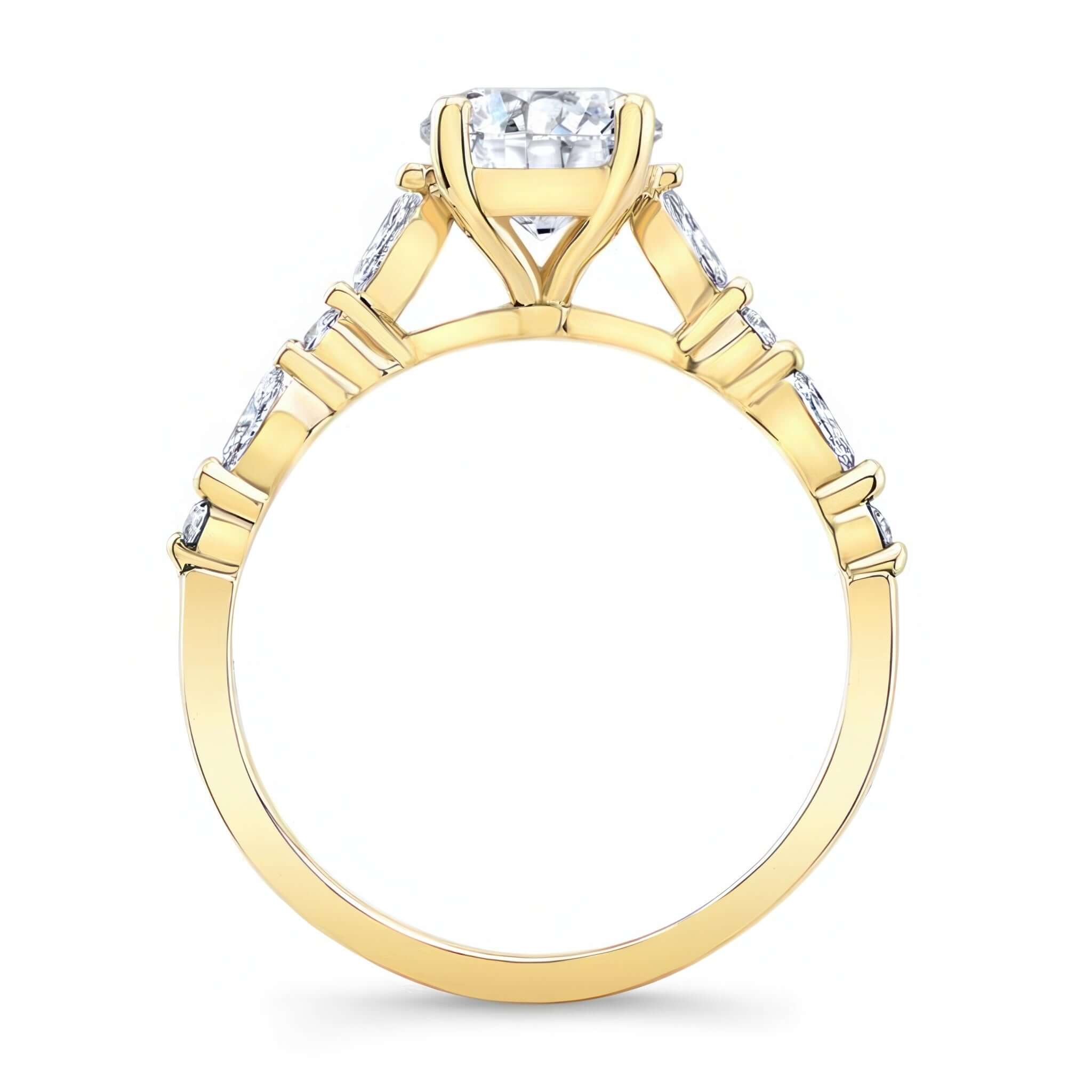 Vintage Style Diamond Ring featuring a round center with alternating round and marquise diamonds on the sides.