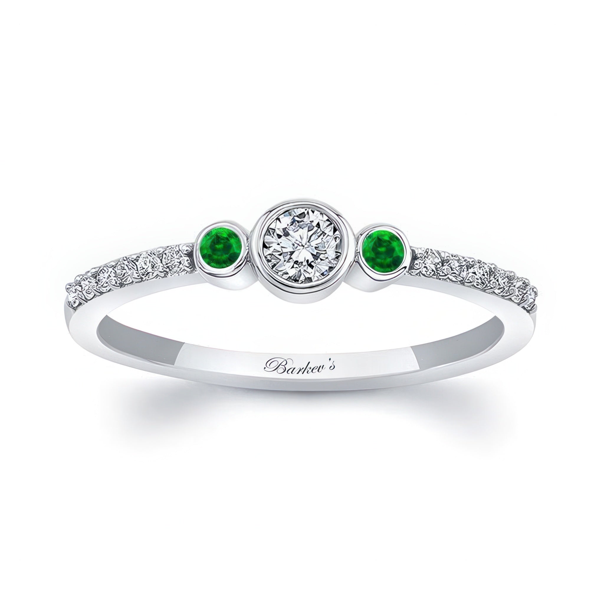 Mia Three Stone Emerald Accent Diamond Promise Ring featuring a diamond center and emerald gemstones on each side.