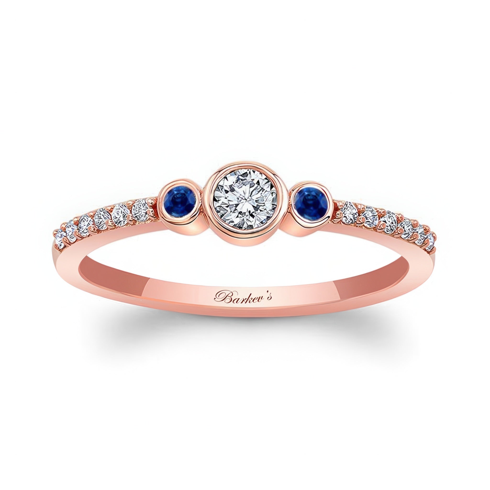 Mia three stone blue sapphire accent diamond promise ring with a brilliant center diamond and rose gold band.