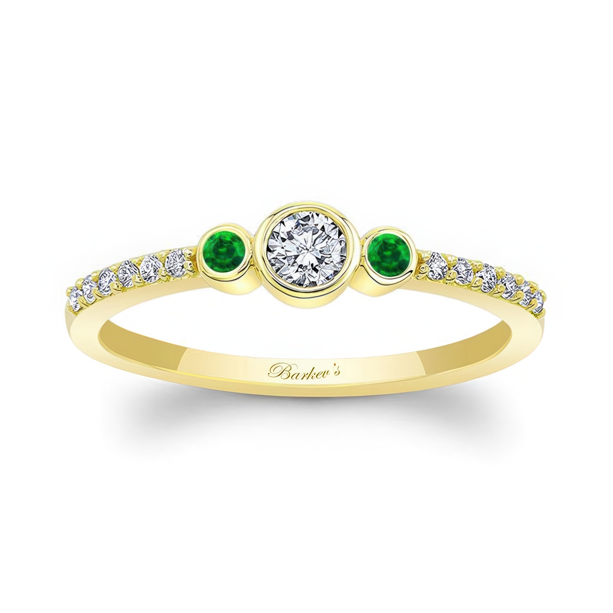Mia Three Stone Emerald Accent Diamond Promise Ring featuring a bezel set diamond and emerald side stones in yellow gold.