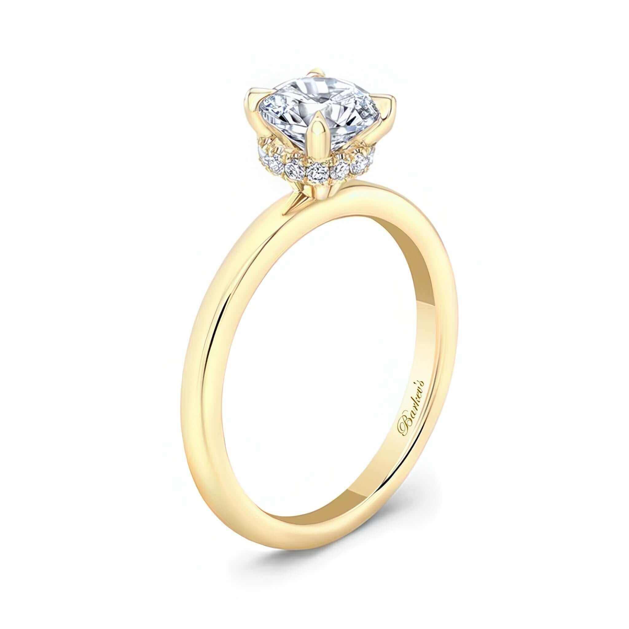 Round Hidden Halo Engagement Ring with a prong set round center and micro pave diamond halo in yellow gold.