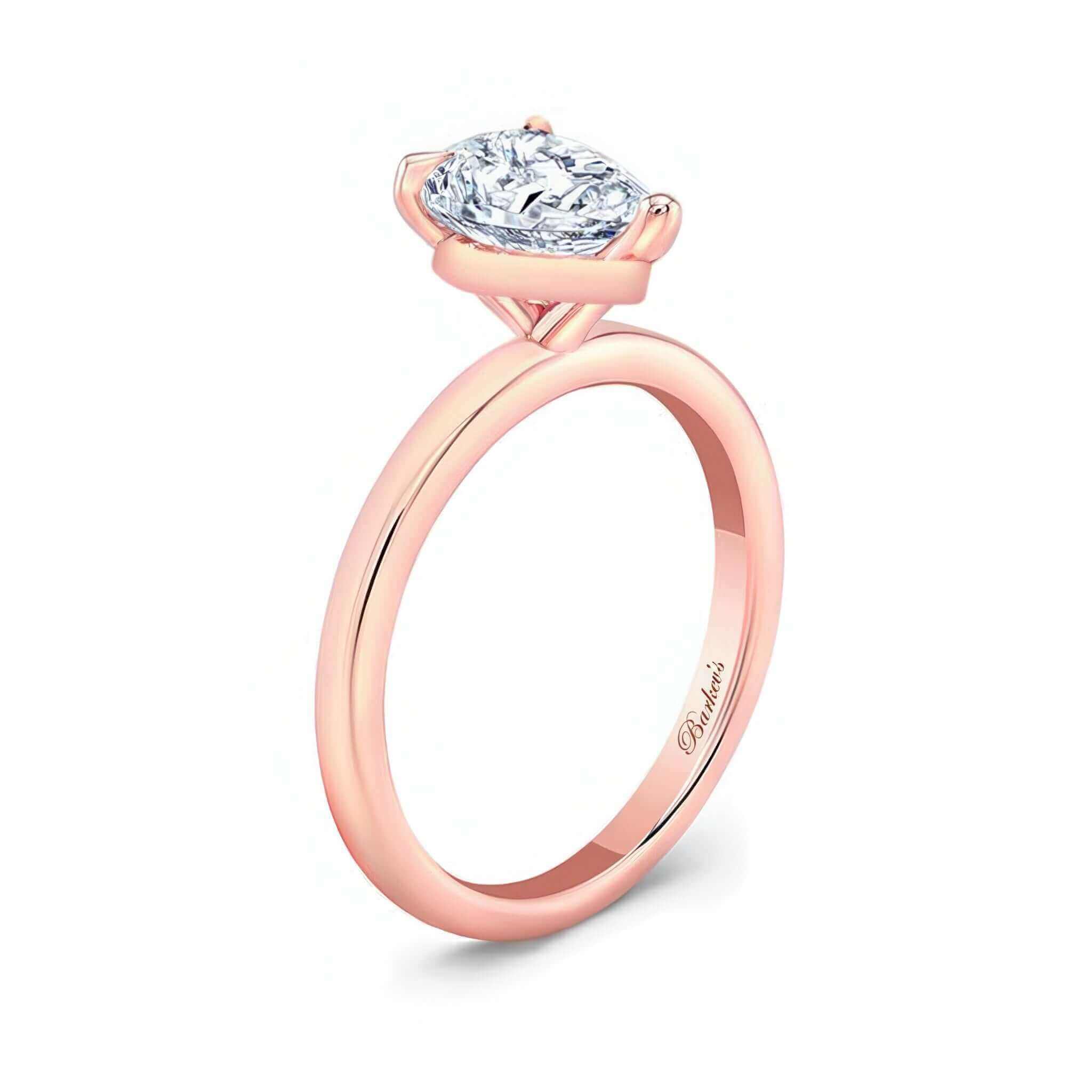 Pear Lab Grown Diamond Solitaire Ring in a rose gold setting with a prong set pear shape center stone.