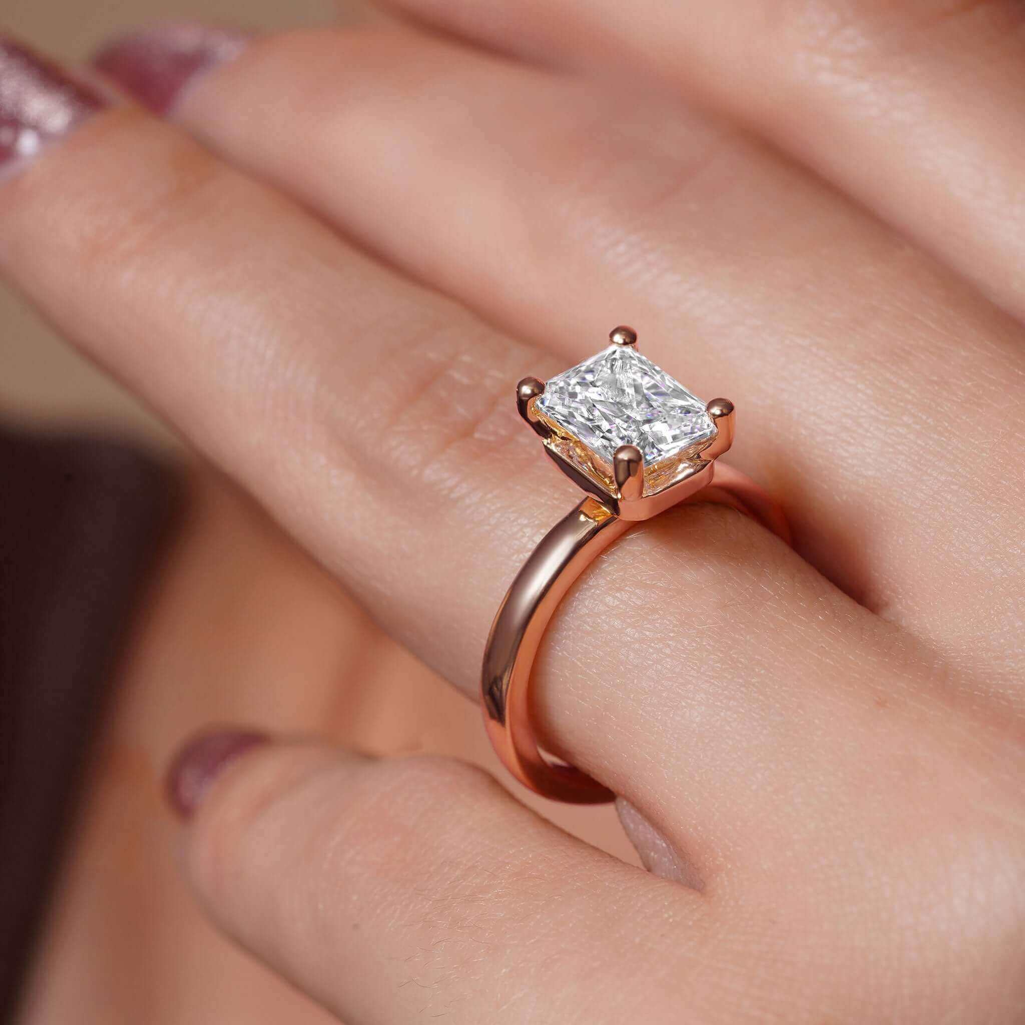 Radiant Cut Lab Diamond Solitaire Engagement Ring with a stunning 2.00ct center stone in a rose gold setting.