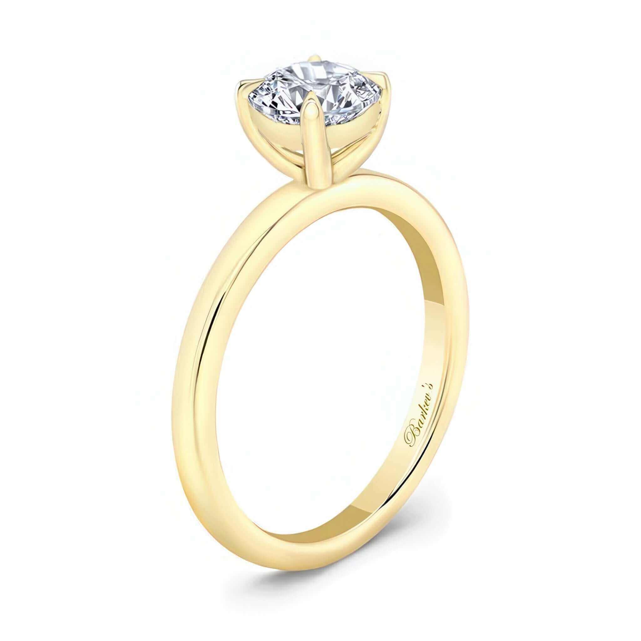 Lab Diamond Solitaire Ring featuring a prong set round center in a modern yellow gold band.