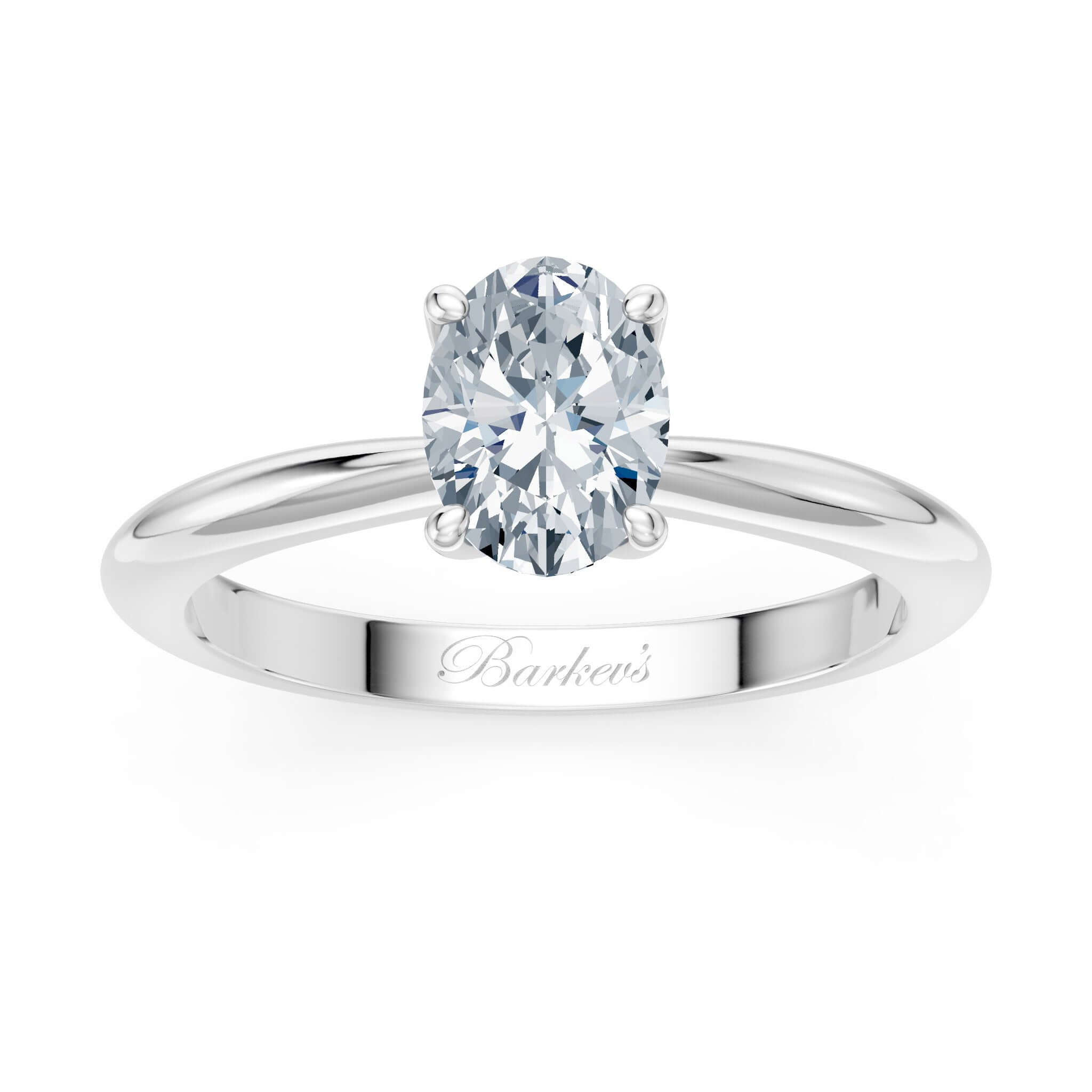 1 Carat Oval Solitaire Diamond Ring with a prong set oval diamond on a shiny gold shank.