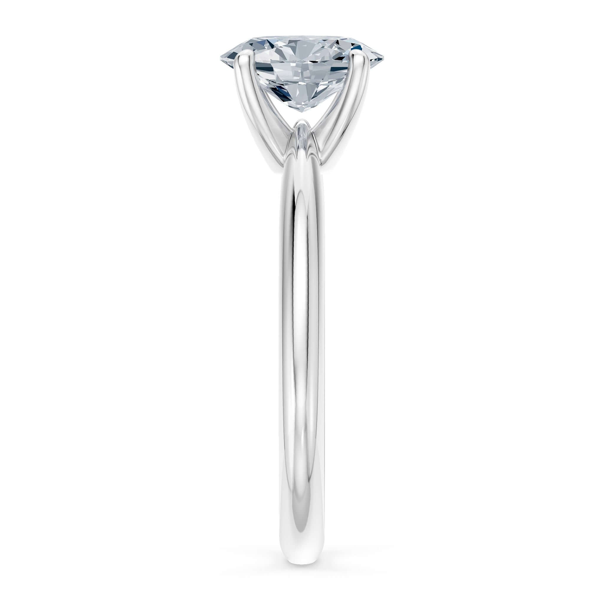1 Carat Oval Solitaire Diamond Ring on a shiny gold shank showcasing elegant design.