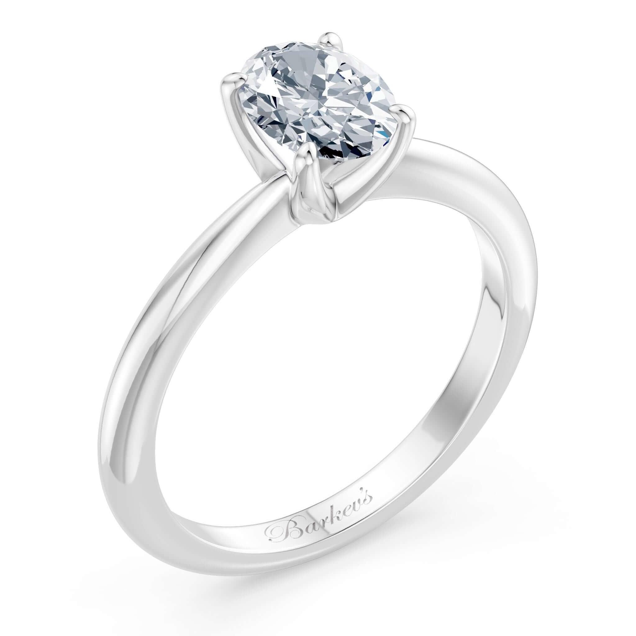 1 Carat Oval Solitaire Diamond Ring on a shiny gold shank with a comfort fit design.