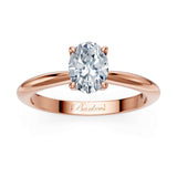 1 Carat Oval Solitaire Diamond Ring set in a sleek gold band with a stunning oval center stone.