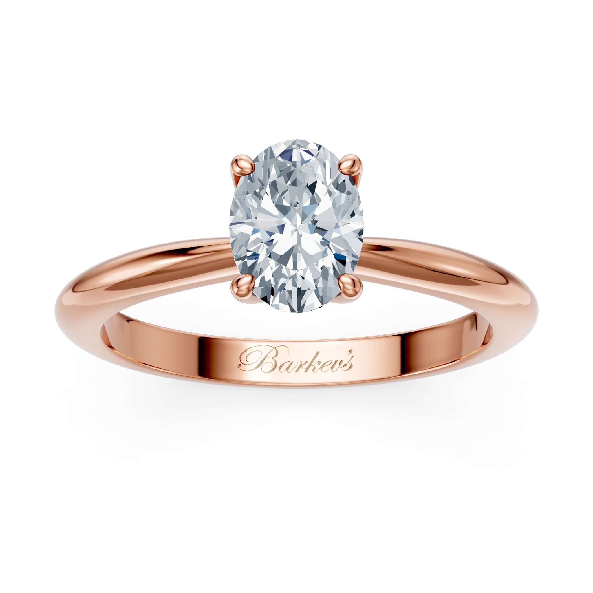 1 Carat Oval Solitaire Diamond Ring set in a sleek gold band with a stunning oval center stone.
