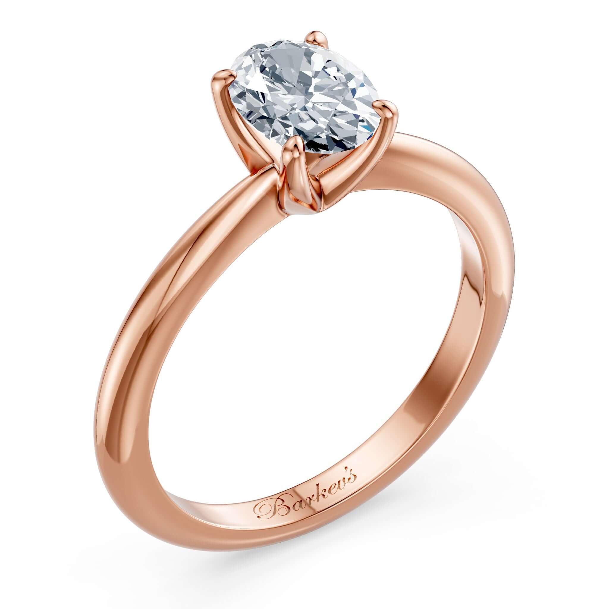 1 Carat Oval Solitaire Diamond Ring in rose gold setting with a stunning prong-set oval diamond centerpiece.