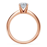 1 Carat Oval Solitaire Diamond Ring set in rose gold, featuring a prong-set oval diamond at the center.
