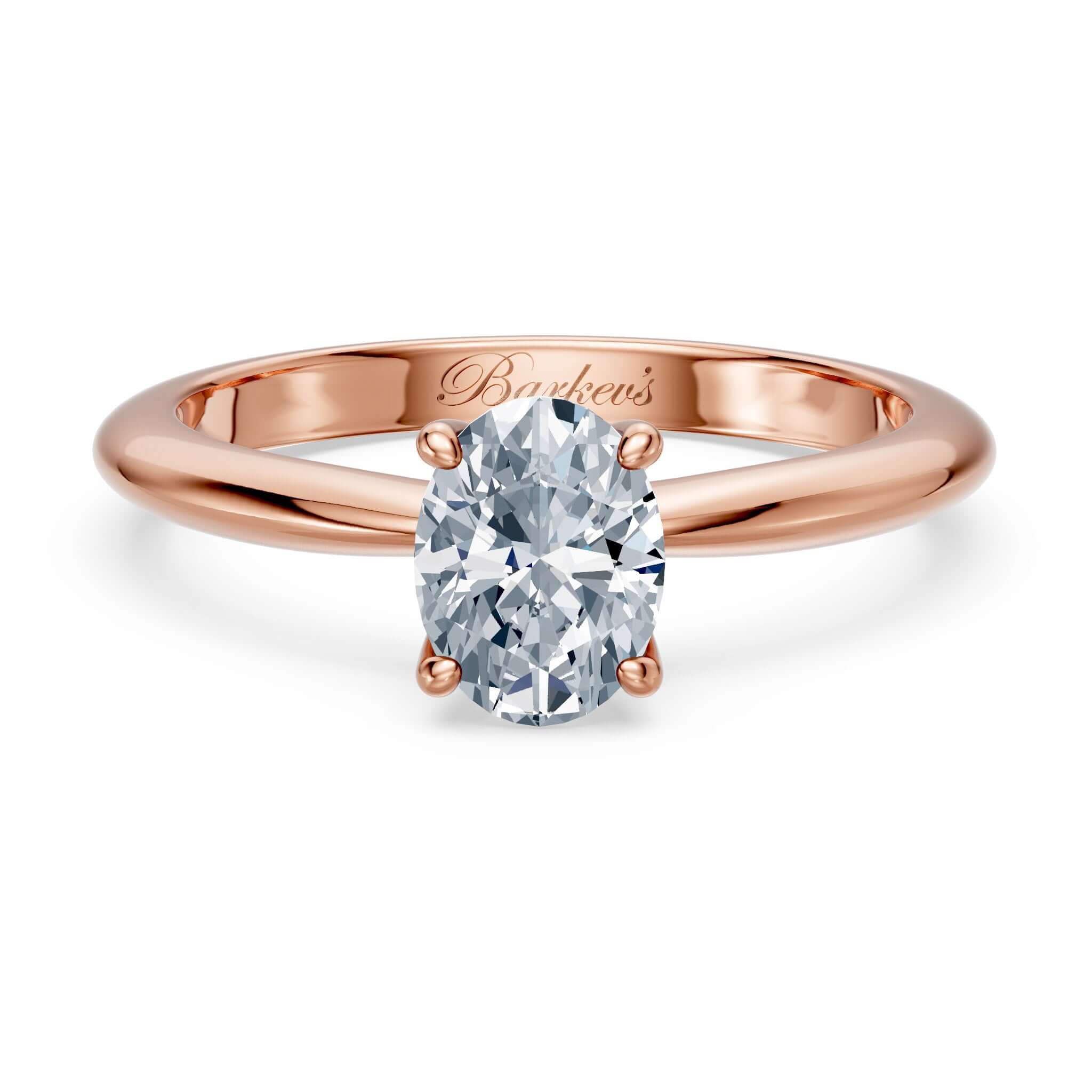 1 Carat Oval Solitaire Diamond Ring with oval center set in gold shank, elegant design by Barkev's.