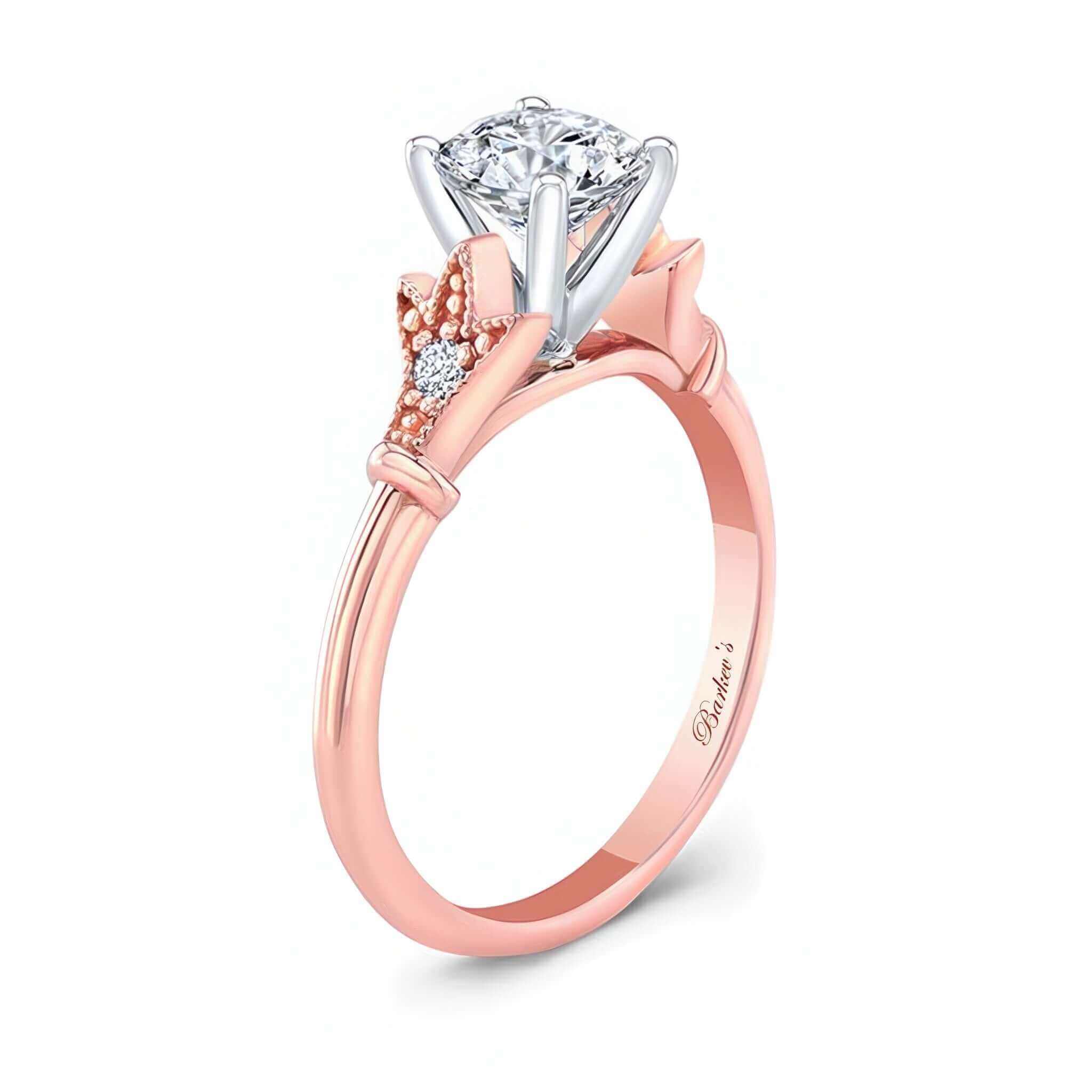 Petite Leaf Moissanite Engagement Ring featuring a prong set round center and leaf motif design.