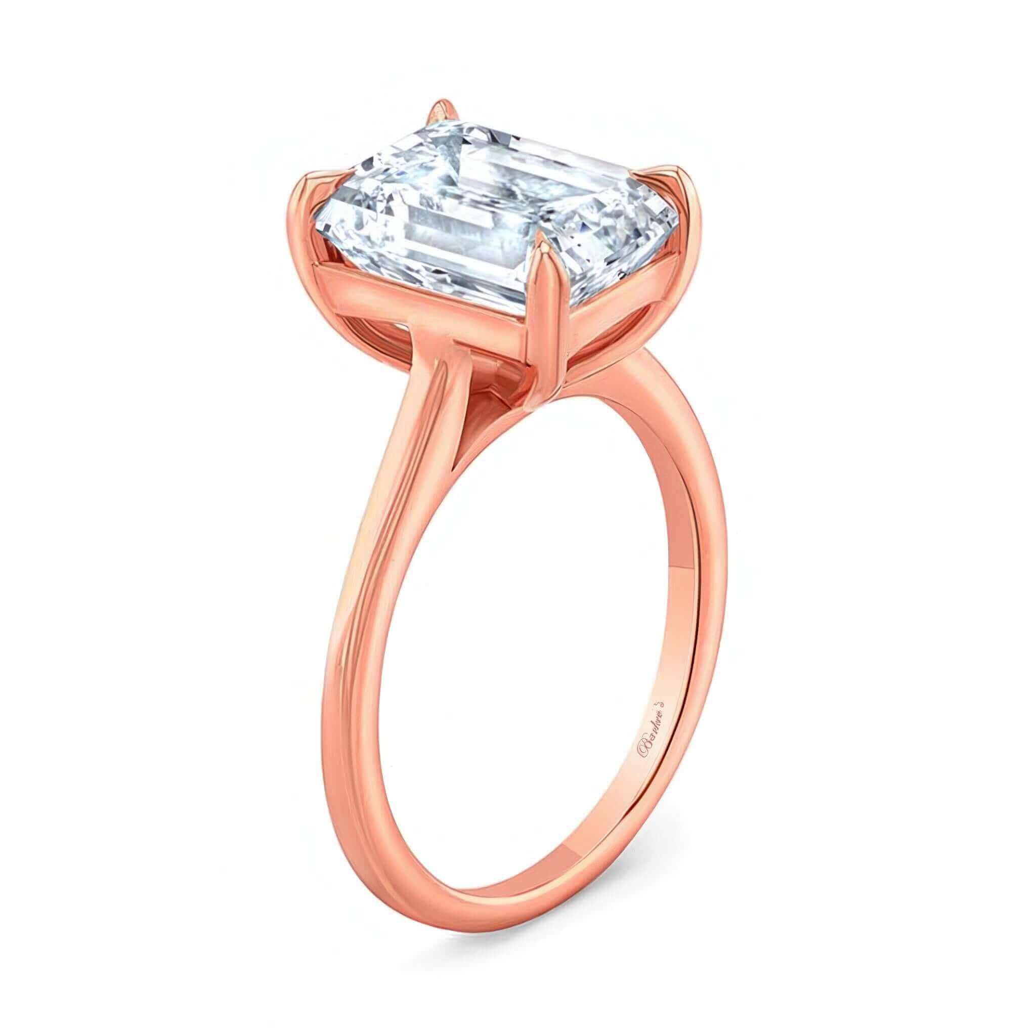 2 Carat Emerald Cut Lab Diamond Solitaire Engagement Ring in rose gold with a sparkling emerald cut diamond centerpiece.