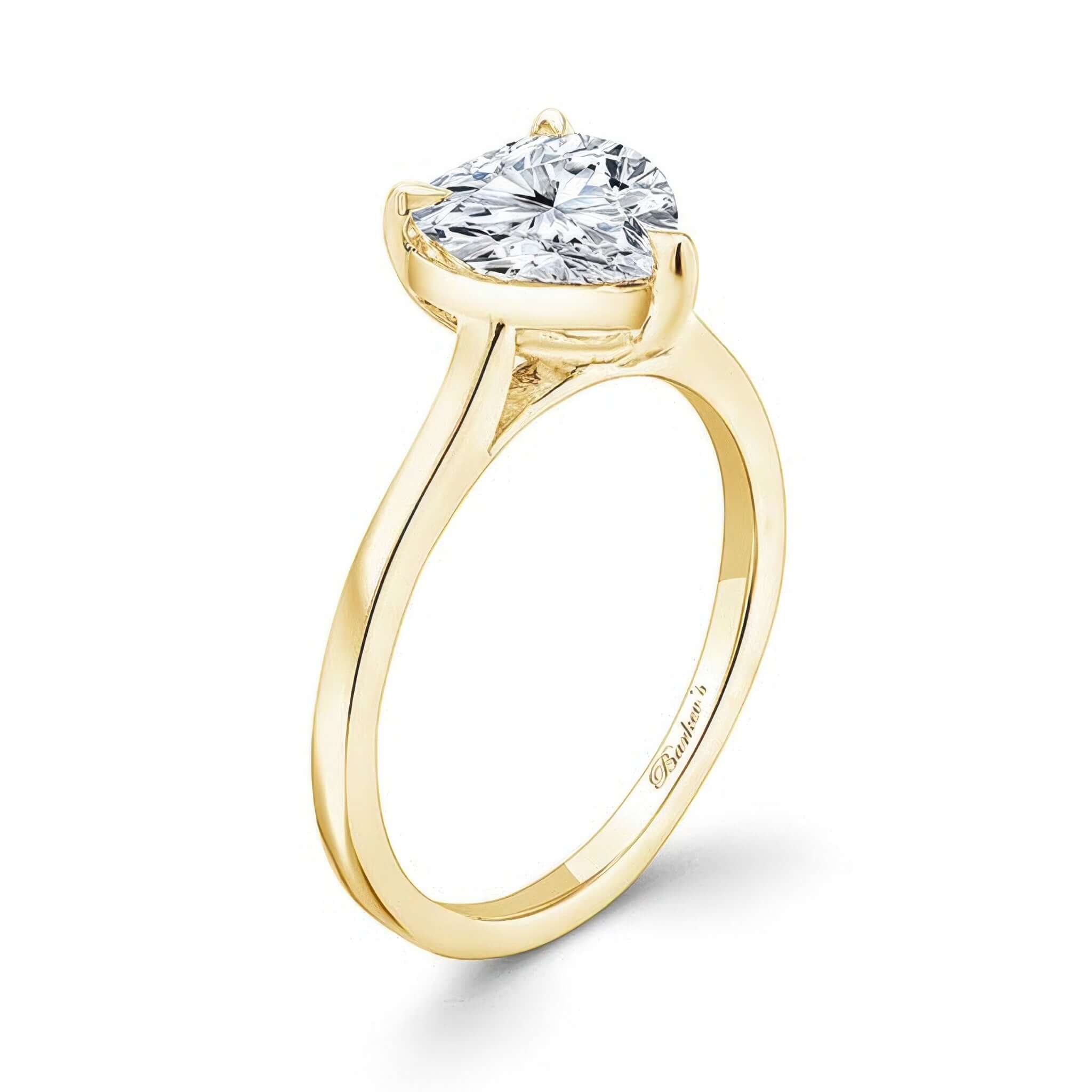 2 Carat Heart Shape Lab Diamond Solitaire Engagement Ring in yellow gold with a sparkling centerpiece.