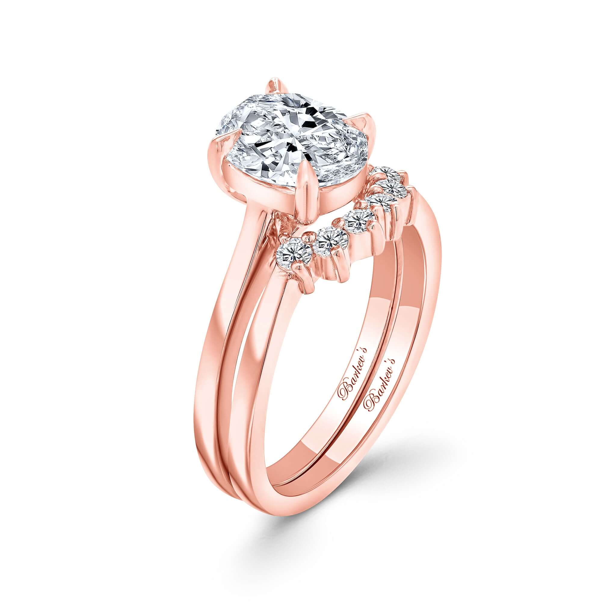 2 Carat Oval Diamond Bridal Set with a sparkling centerpiece and elegant wedding band.