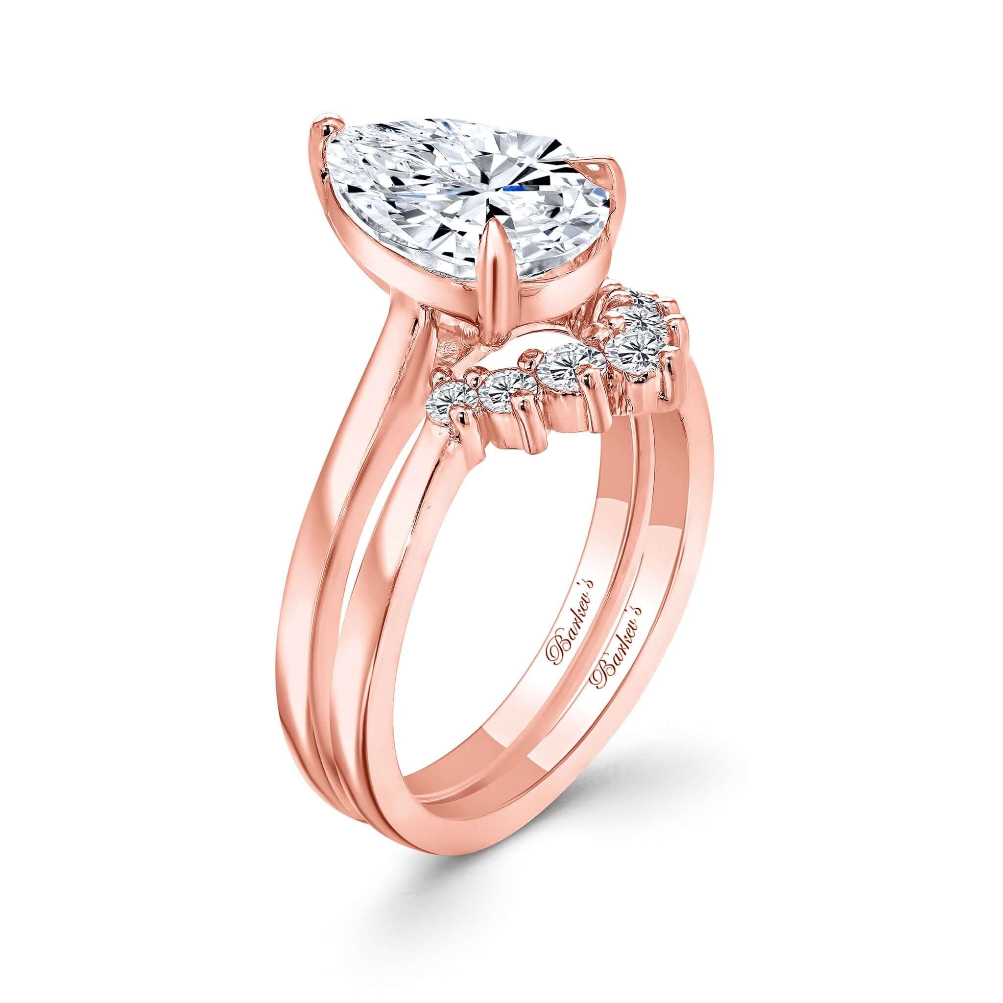 2 Carat Pear Shape Moissanite Bridal Set with a stunning pear-shaped centerpiece and diamond band in rose gold.