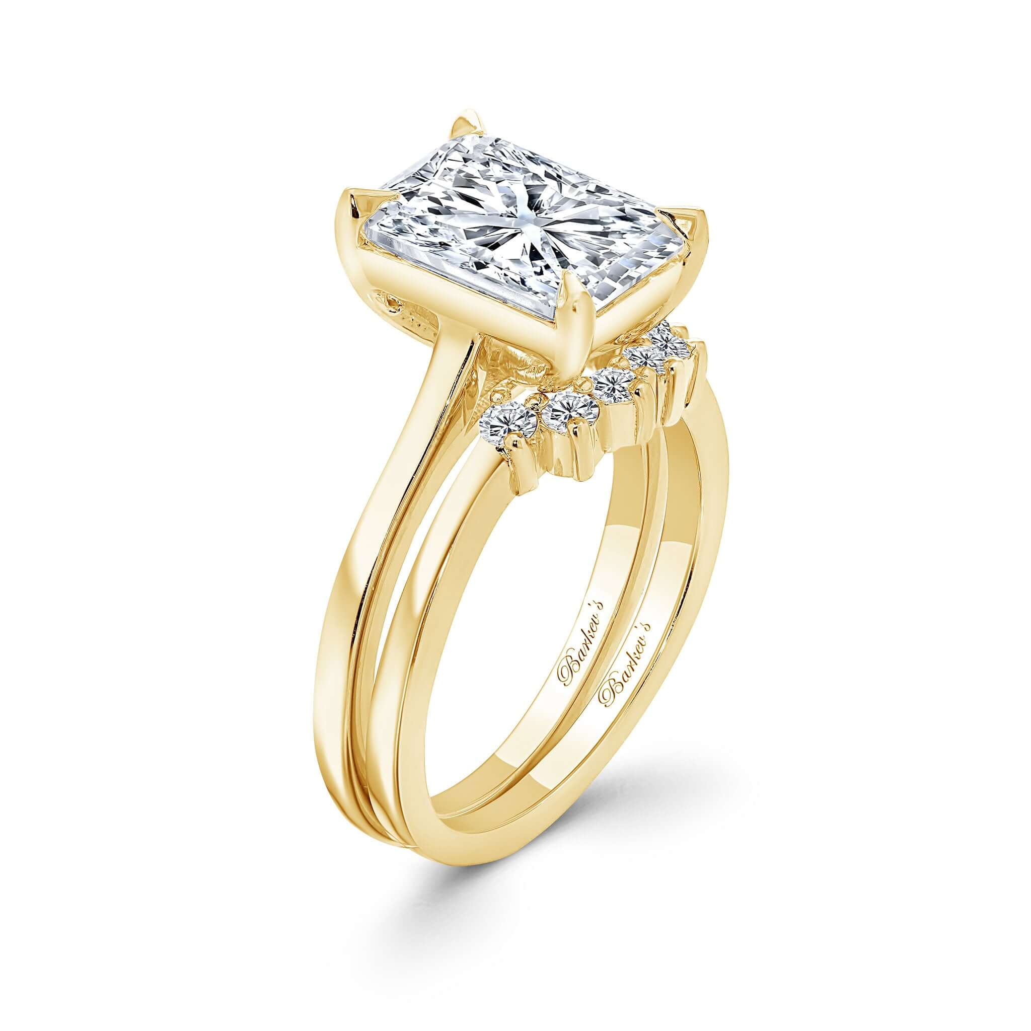 2 Carat Radiant Moissanite Bridal Set featuring a stunning centerpiece and diamond wedding band.