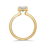Double band 2 carat emerald cut diamond solitaire ring in gold, showcasing elegant design and brilliance.