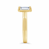 Double Band 2 Carat Emerald Cut Diamond Solitaire Ring in yellow gold showcasing modern elegance.