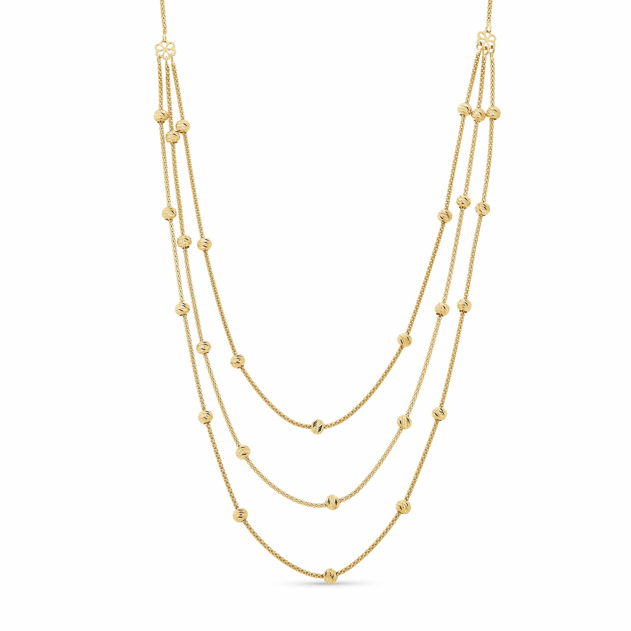 Gold necklace with multiple beaded strands on a white background