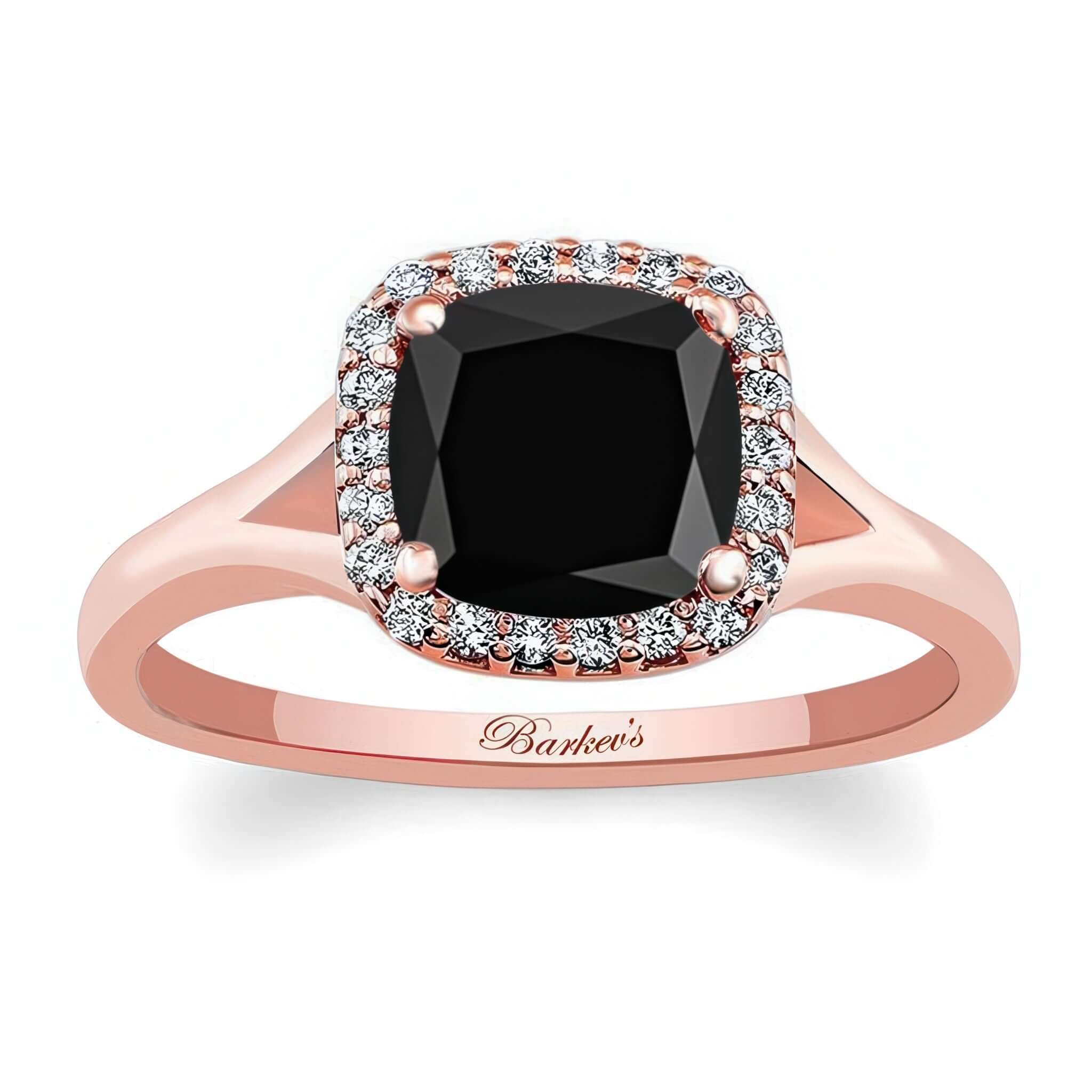 Cushion Black And White Diamond Halo Ring featuring a cushion cut center and shared prong set diamonds.