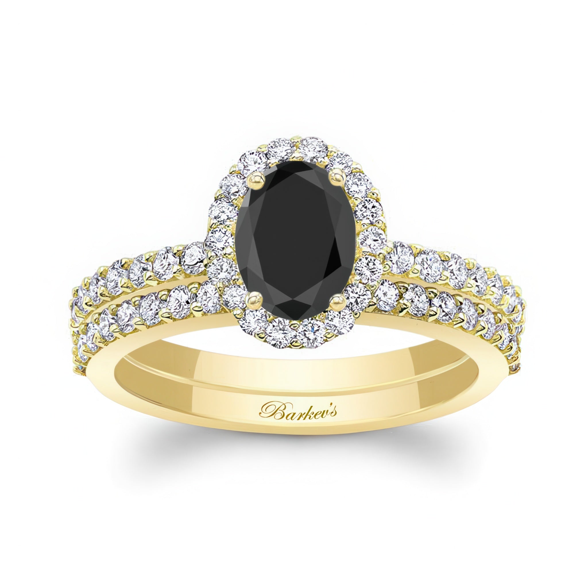 Oval Black And White Diamond Halo Wedding Set featuring an oval black diamond engagement ring in gold.