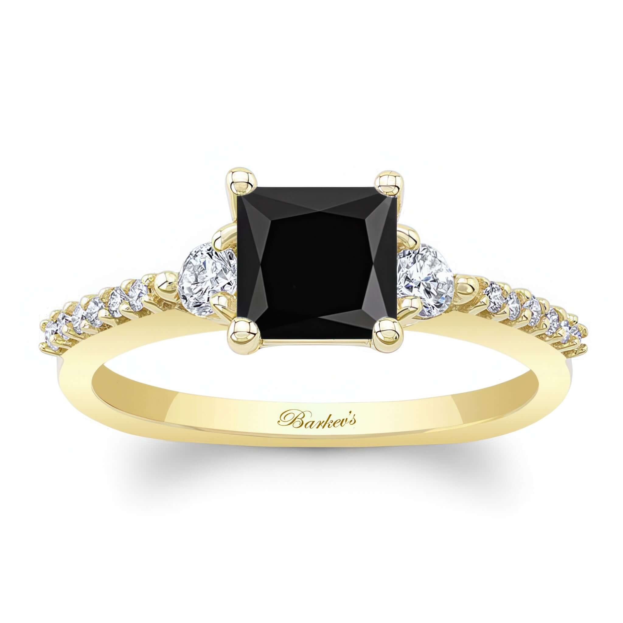 Black And White Diamond 3 Stone Princess Cut Engagement Ring with a prong-set center and diamond accents.
