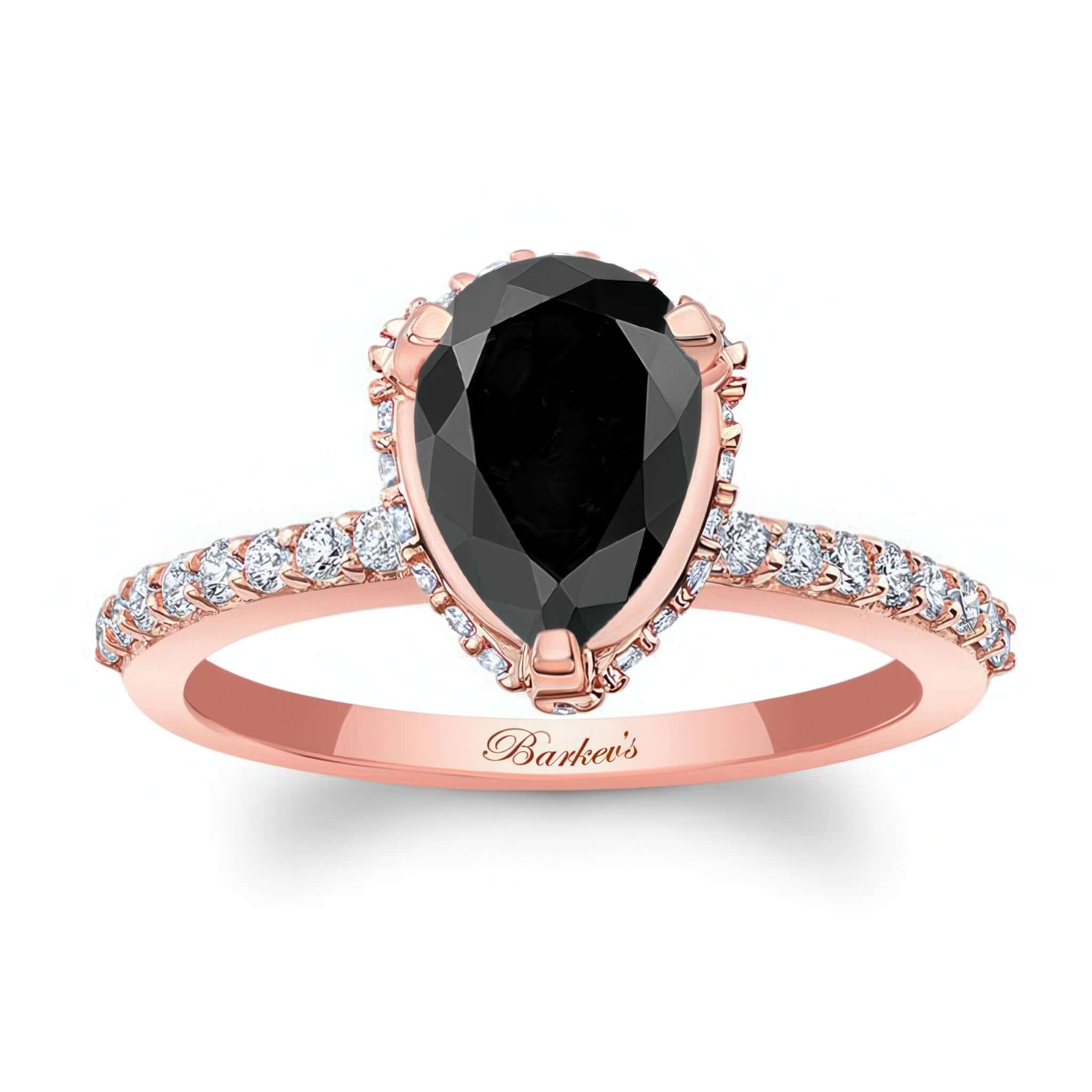 Teardrop Black And White Diamond Engagement Ring featuring a pear shaped black diamond in a rose gold setting.