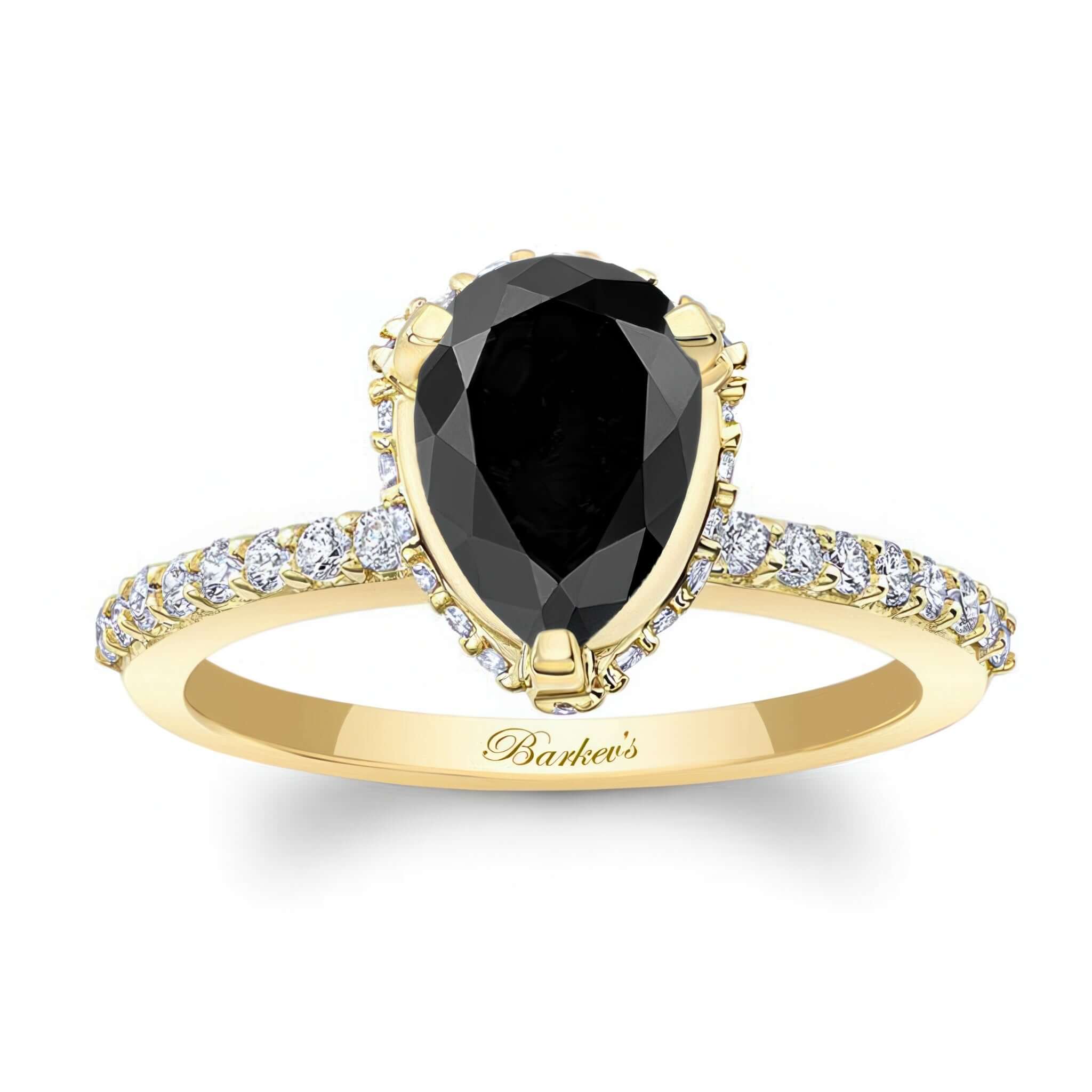 Teardrop Black And White Diamond Engagement Ring featuring a pear shaped black diamond in a yellow gold setting.