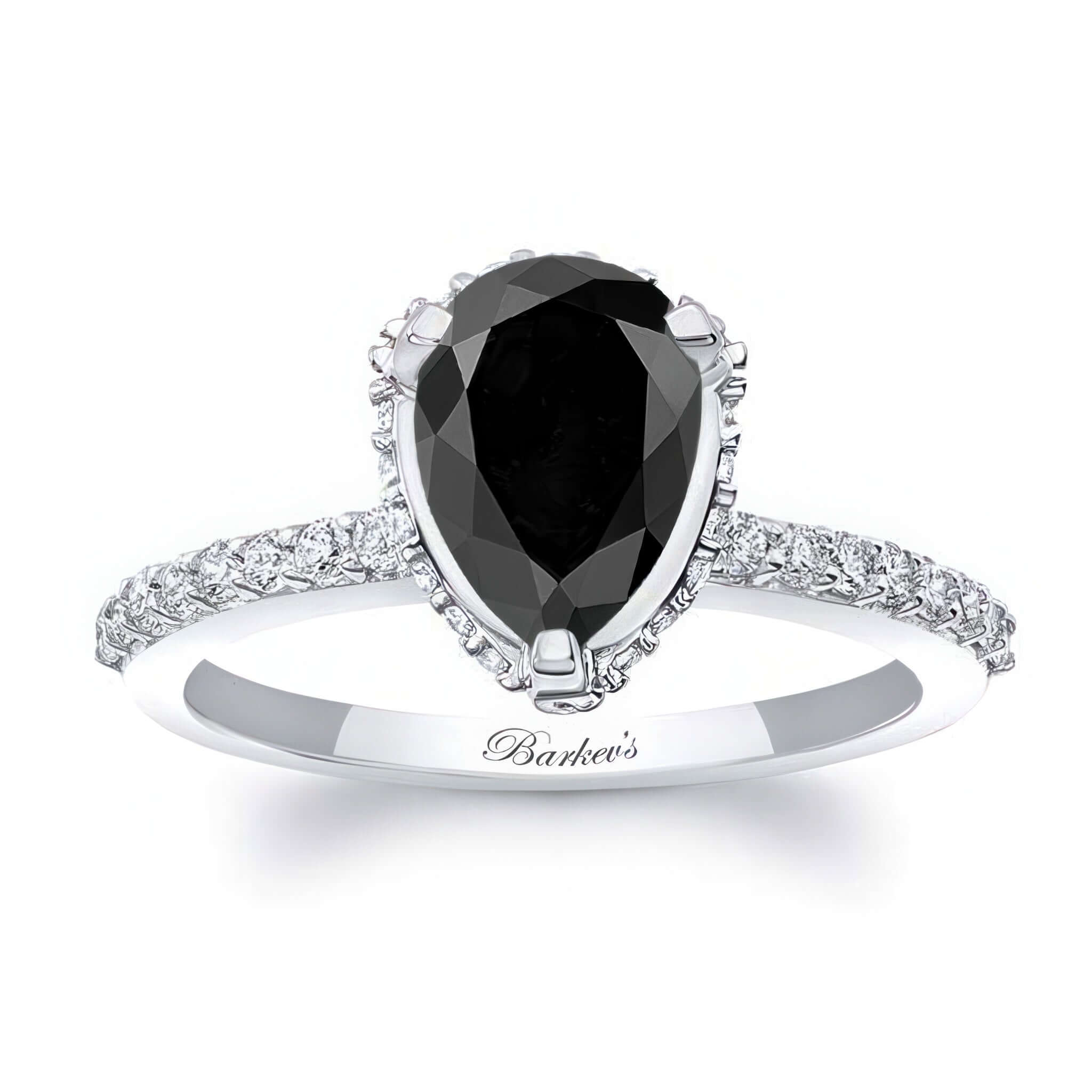 Teardrop Black And White Diamond Engagement Ring with a pear-shaped black diamond and sparkling shank.
