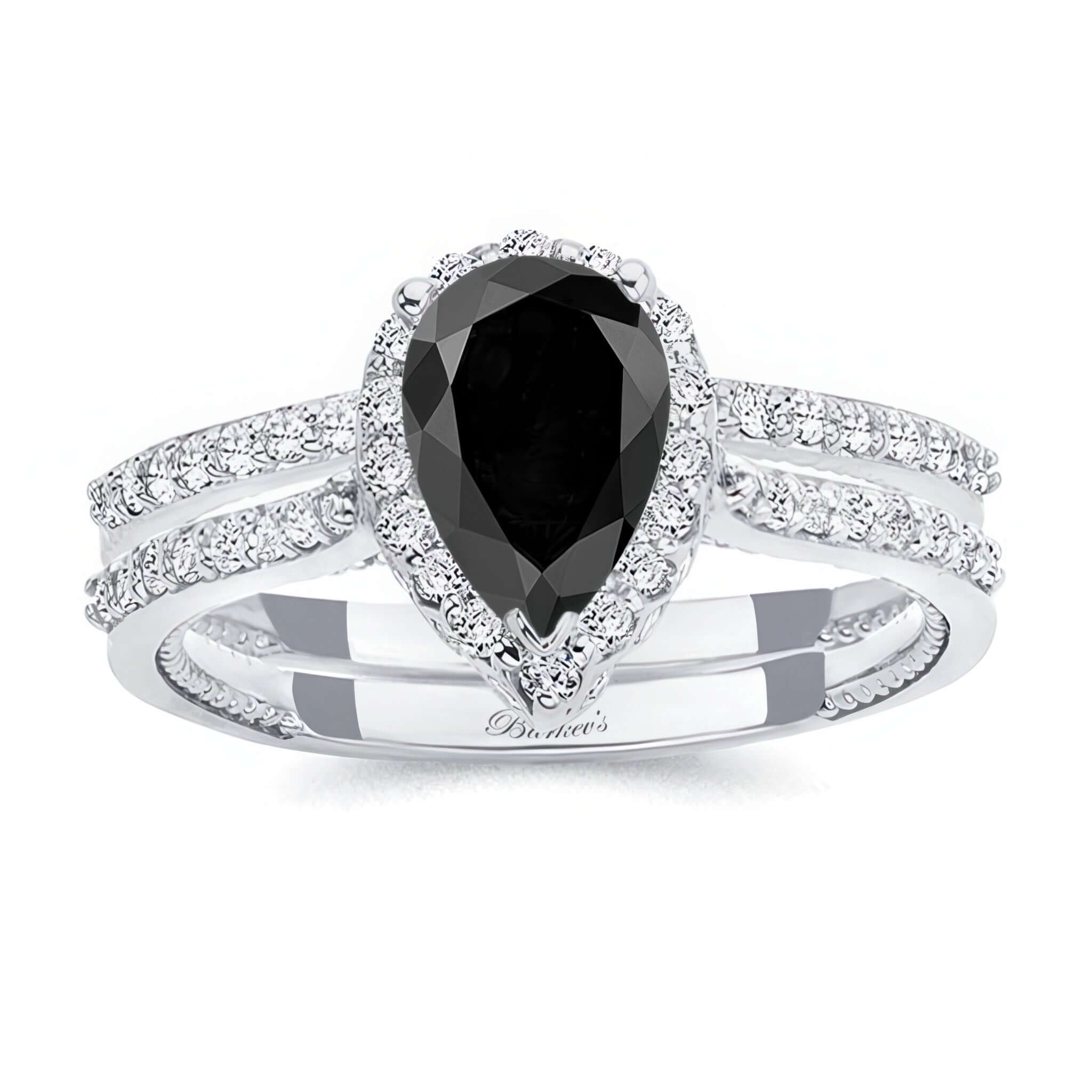 Pear Shaped Black And White Diamond Halo Ring Set featuring a black diamond center with elegant diamond accents.