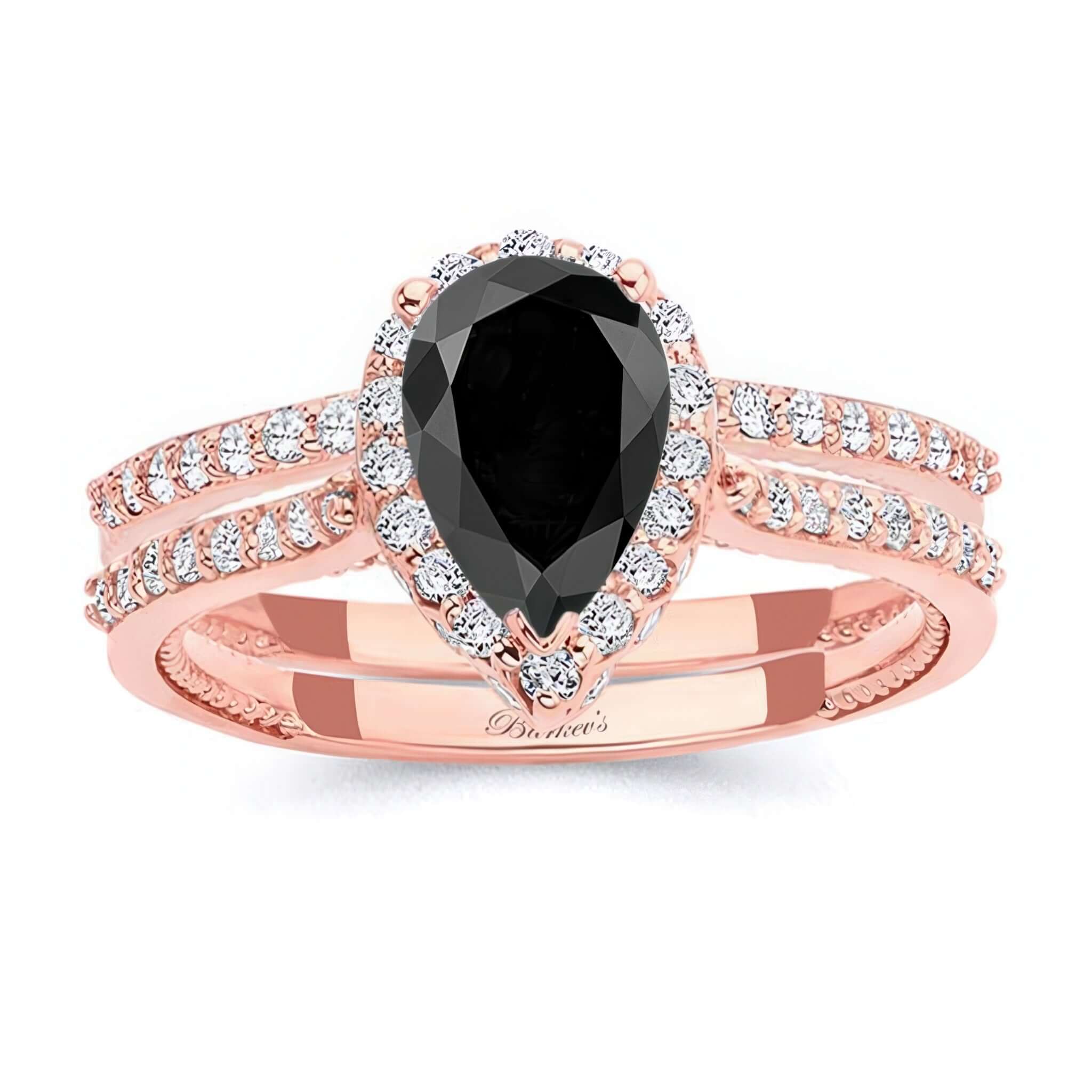 Pear Shaped Black And White Diamond Halo Ring Set featuring a black pear-shaped center and diamond accents.