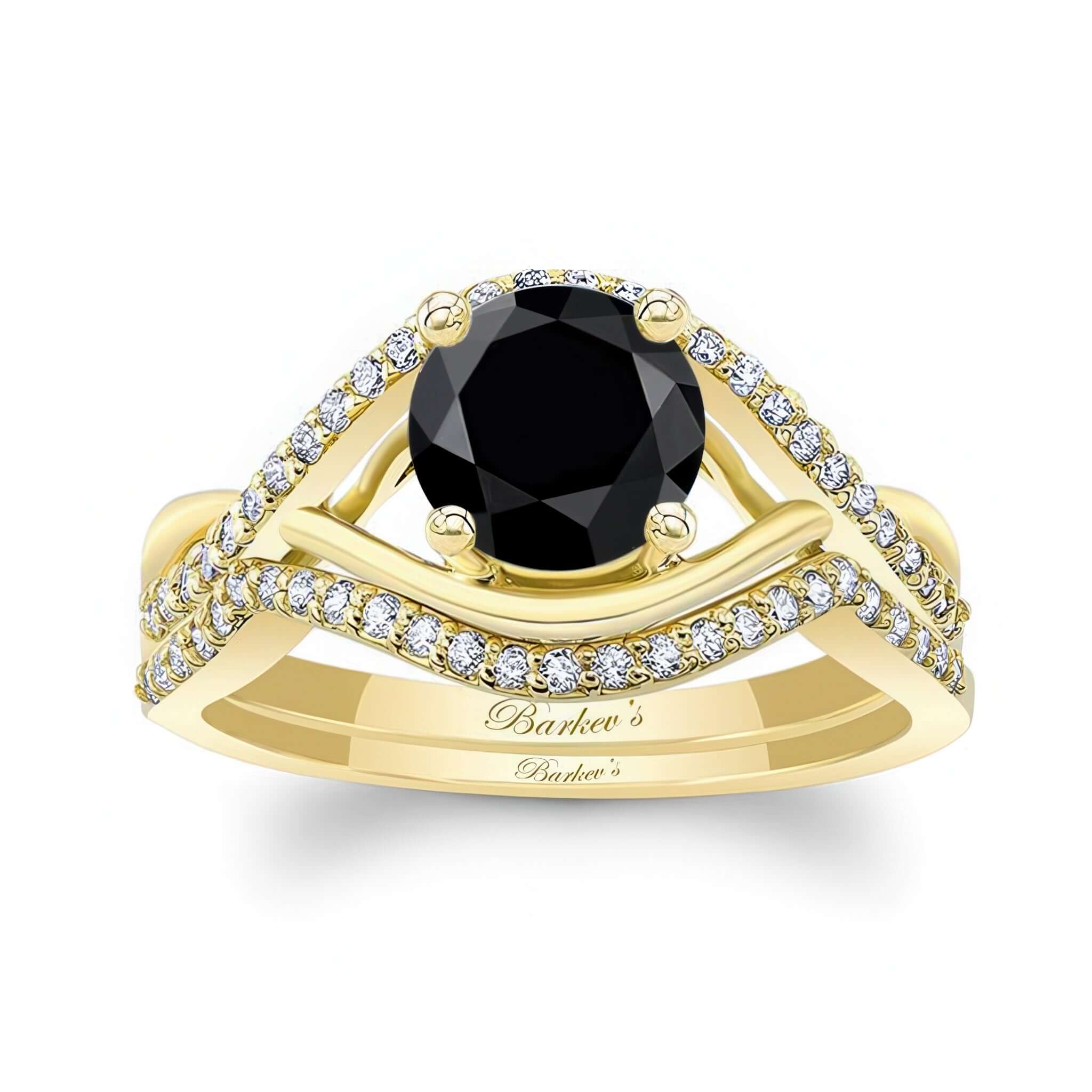 Black And White Diamond Criss Cross Ring Set featuring a black center stone and diamond accents in a gold setting.