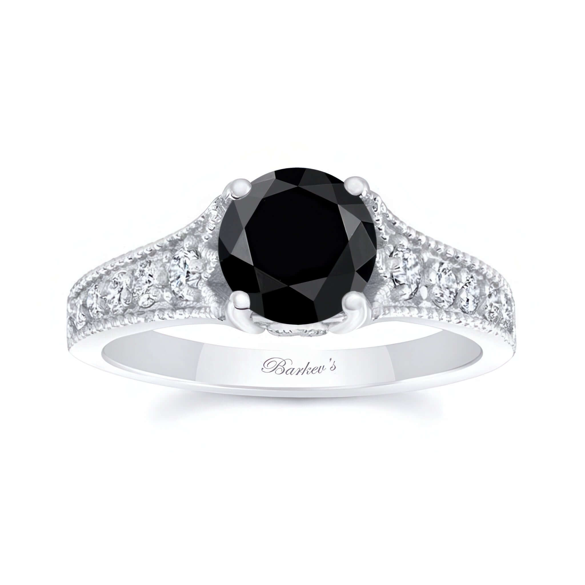 Black And White Diamond Vintage Ring featuring a prong set round black diamond with shared prong set diamonds on the sides.