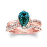 Pear Shaped Blue And White Diamond Twist Bridal Set