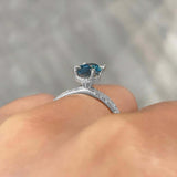 1.25 Carat Oval Blue And White Diamond Ring