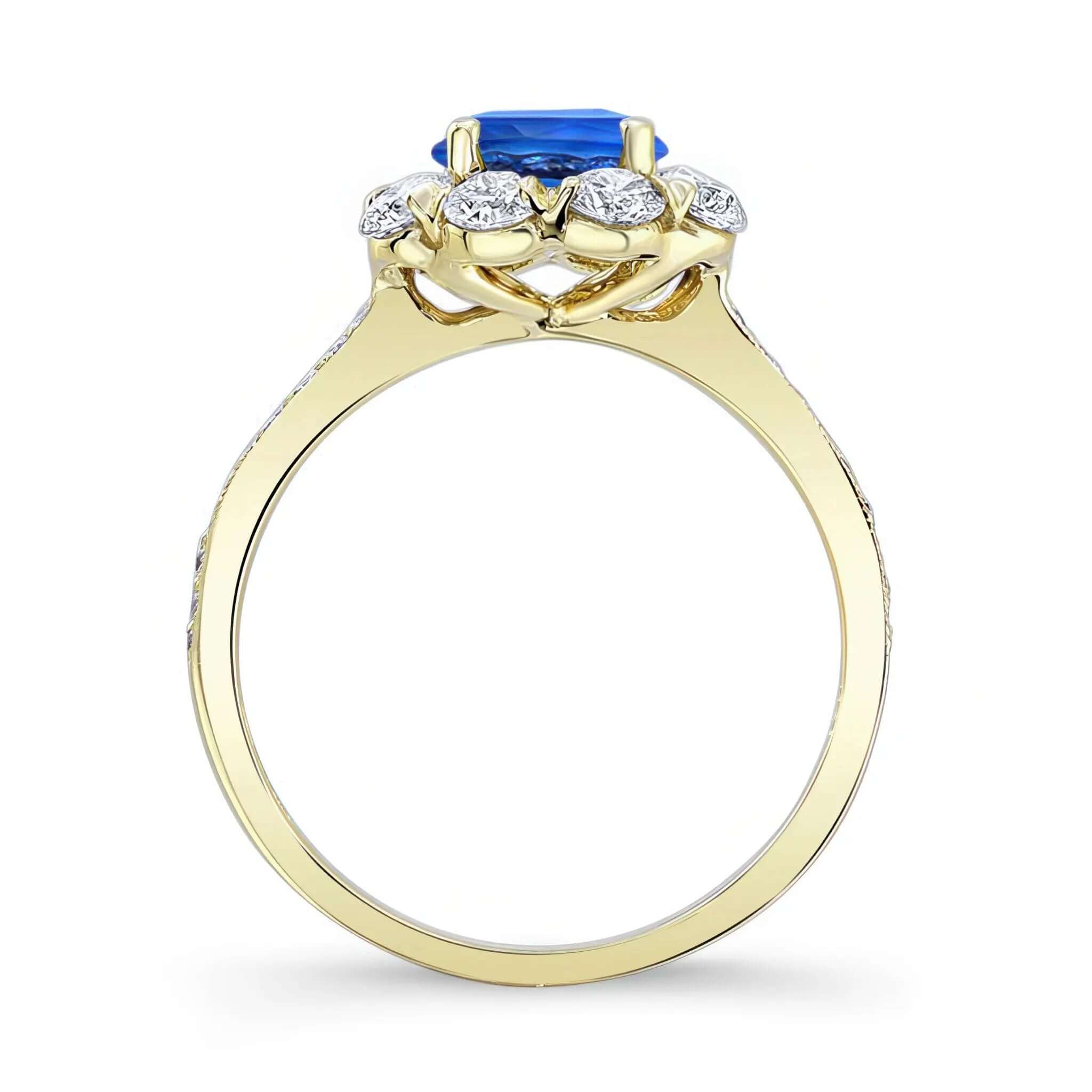 Flower Halo Blue Sapphire And Diamond Engagement Ring featuring a stunning blue sapphire in a prong setting.